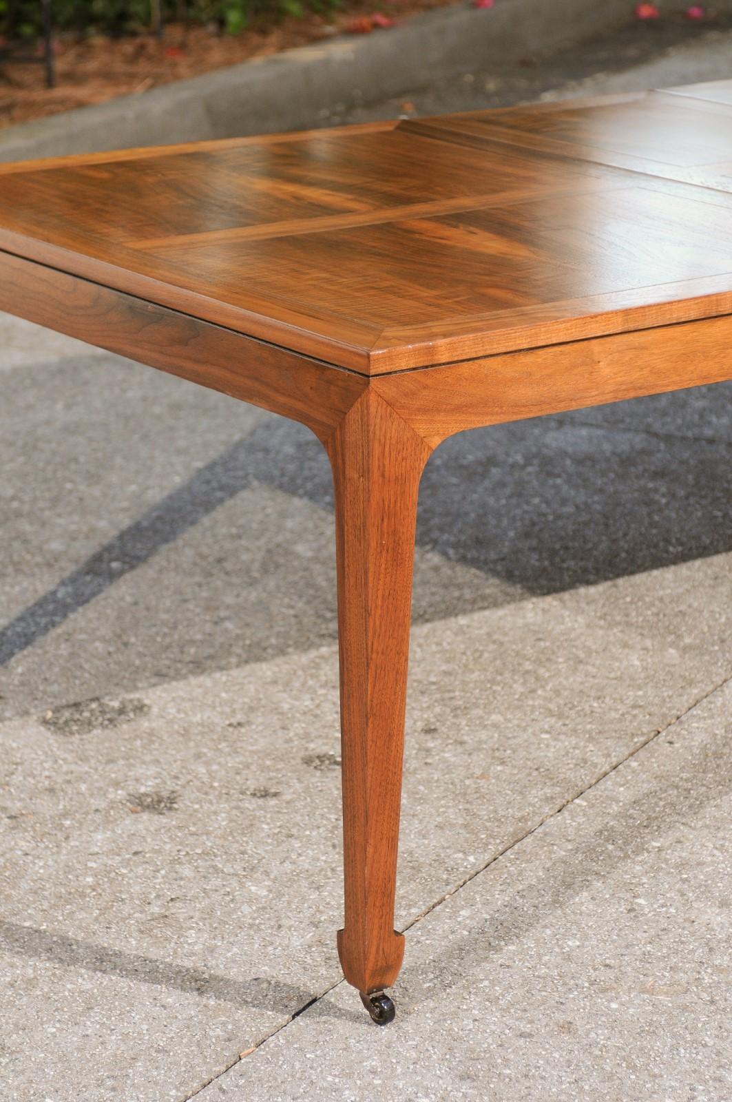 Breathtaking Restored Walnut Extension Dining Table by Baker, circa 1960 In Excellent Condition For Sale In Atlanta, GA