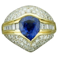 Breathtaking Sapphire and Pave' Diamond Ring in 18 Karat Yellow Gold