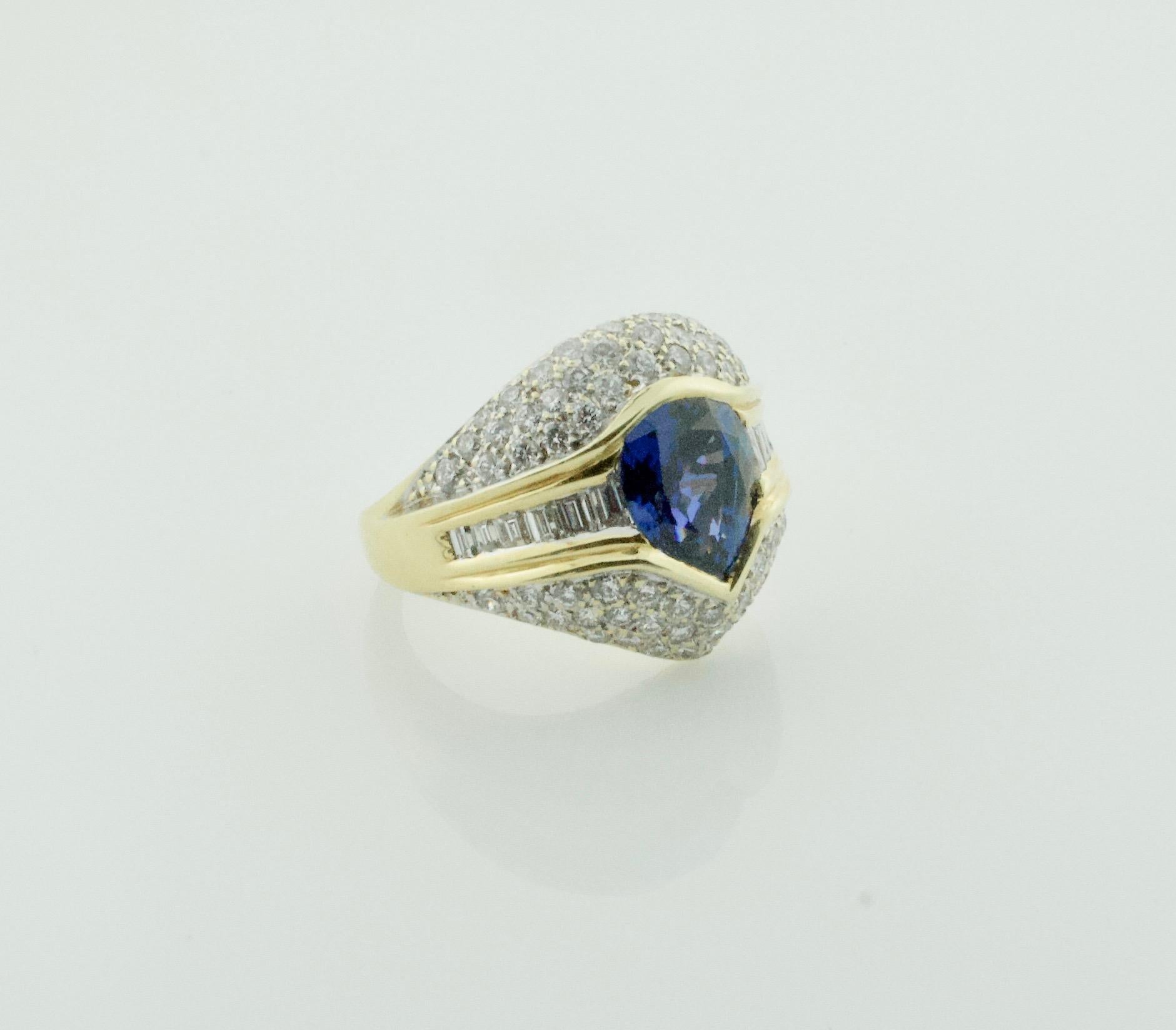 Embrace timeless elegance with our breathtaking Sapphire and Pave Diamond Ring, a mesmerizing testament to luxury and sophistication. Crafted in lustrous 18k yellow gold, this ring exudes opulence and refinement.

At its center, a magnificent