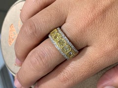 Breathtaking Totaling 5.39ct T.W. Radiant Cut Canary Fancy Yellow Diamond Ring