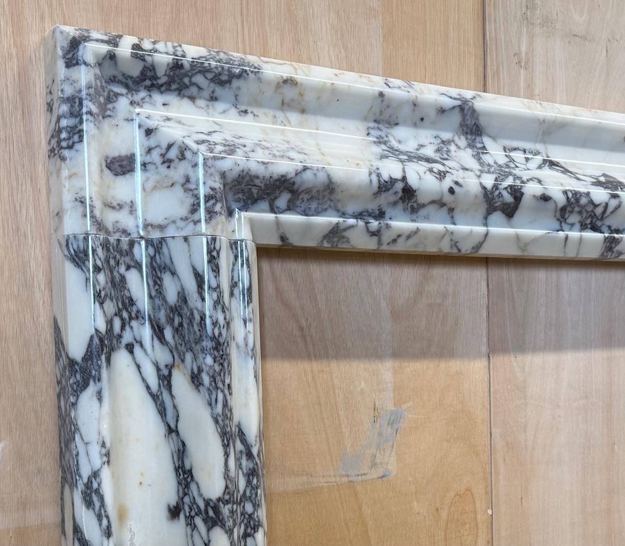 Modern Breccia Viola Marble Bolection Mantel Fireplace by Ryan And Smith For Sale