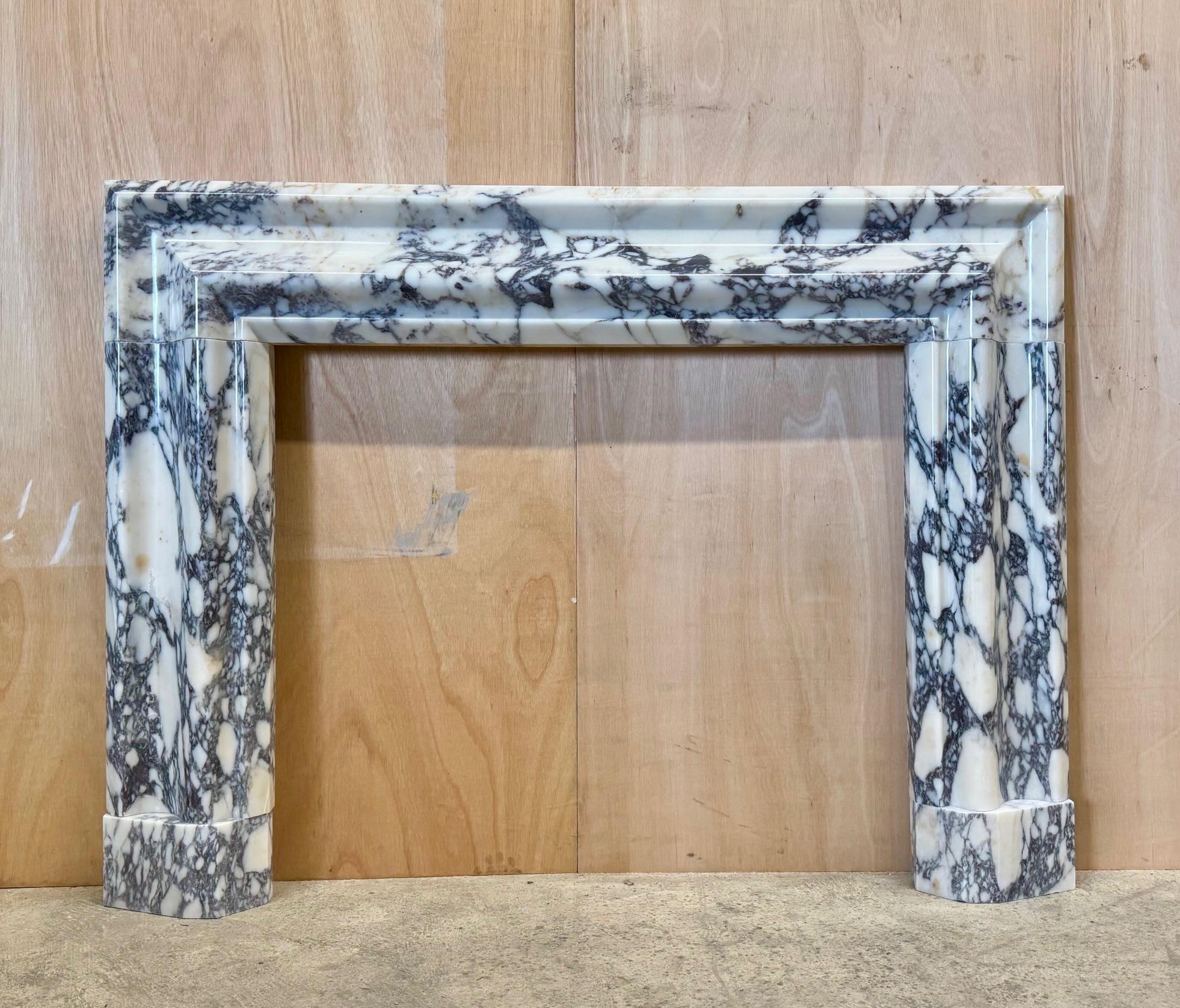 Hand-Crafted Breccia Viola Marble Bolection Mantel Fireplace by Ryan And Smith For Sale