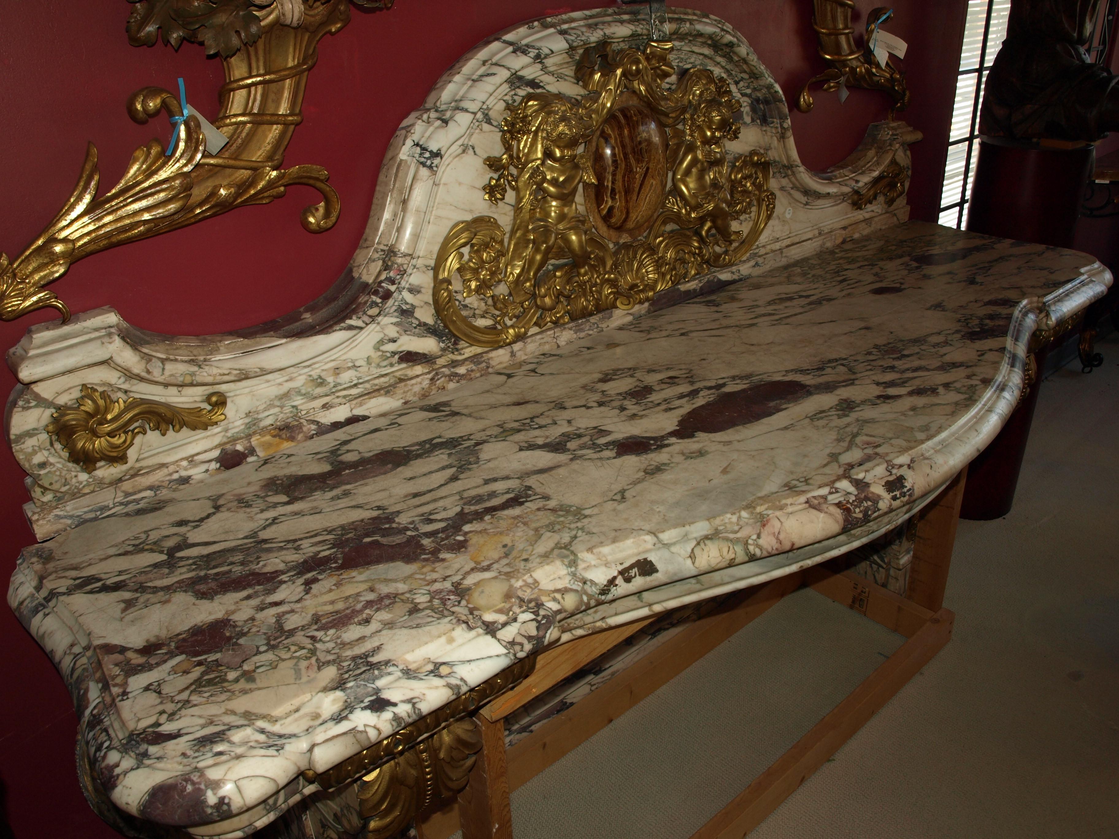 A magnificent Breche Violette marble console with ormolu mounts.
France, circa 1860
Measures: 62