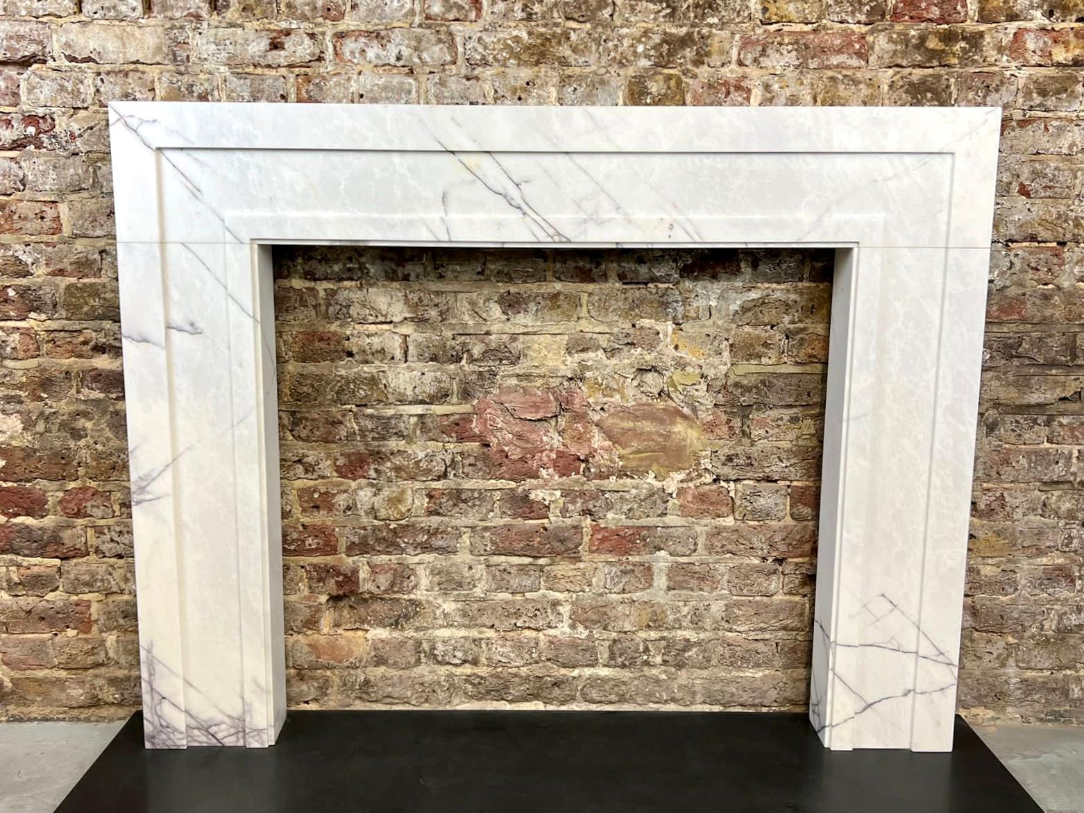Breche Violette marble fireplace mantlepiece.
Recently created. This is one of 2 available made from original Breche Marble. 
