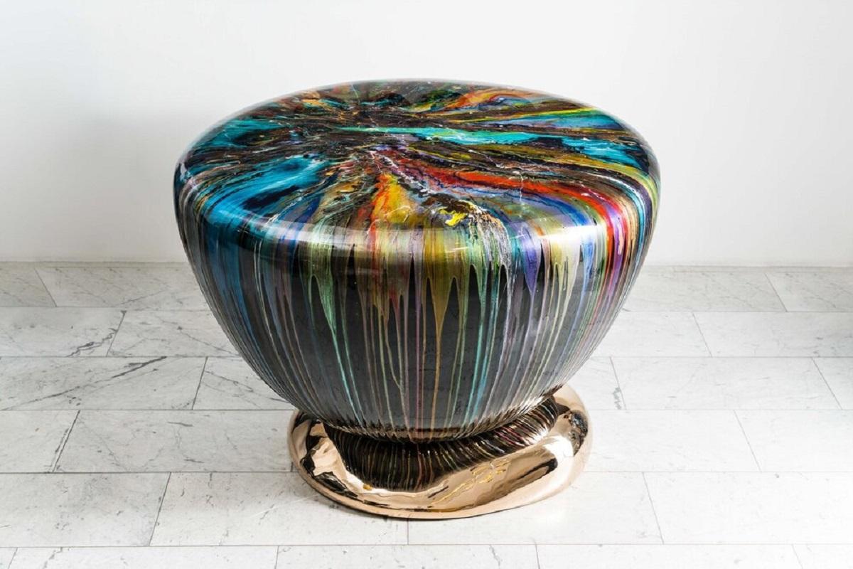 This contemporary center table by artist Brecht Wright Gander features a full table set on top of an organically sculpted bronze base. A center table that functions both as furniture and as sculpture. It was created using resin dripped or 