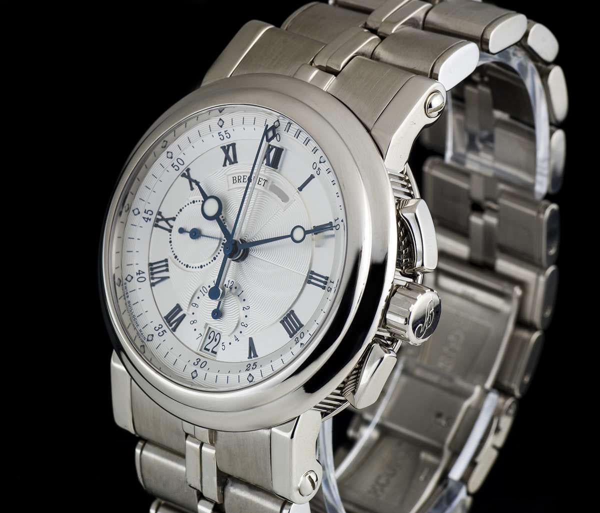 A 42 mm 18k White Gold Marine Chronograph Gents Wristwatch, silver dial hand engraved on a rose engine with roman numerals, date and 12 hour recorder at 6 0'clock, small seconds at 9 0'clock, central seconds counter (blued hand) and central minute
