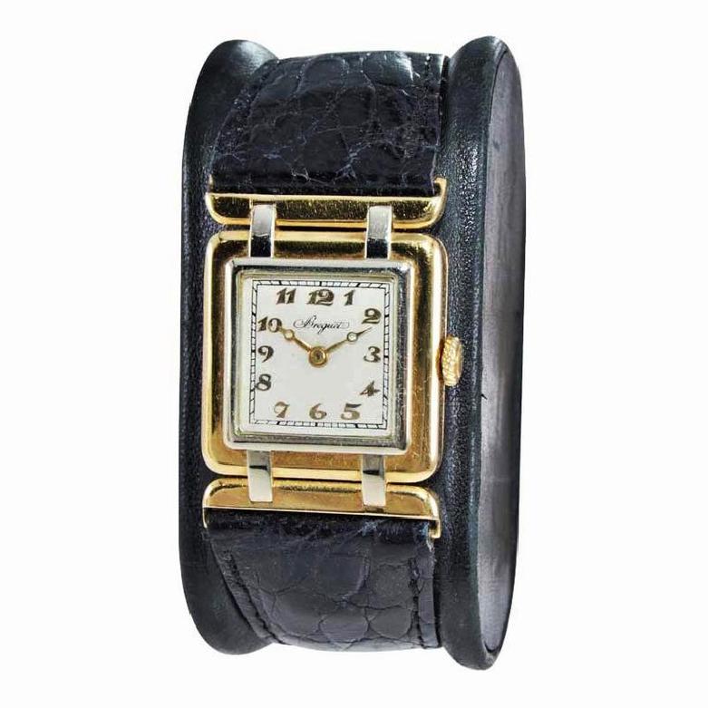 FACTORY / HOUSE: Breguet 
STYLE / REFERENCE: Art Deco / Articulated Lugs
METAL / MATERIAL: 18kt Two Tone Gold
CIRCA / YEAR: 1930's
DIMENSIONS / SIZE: Length 36mm x Diameter 25mm
MOVEMENT / CALIBER: Manual Winding / 18 Jewels / High Grade
DIAL /