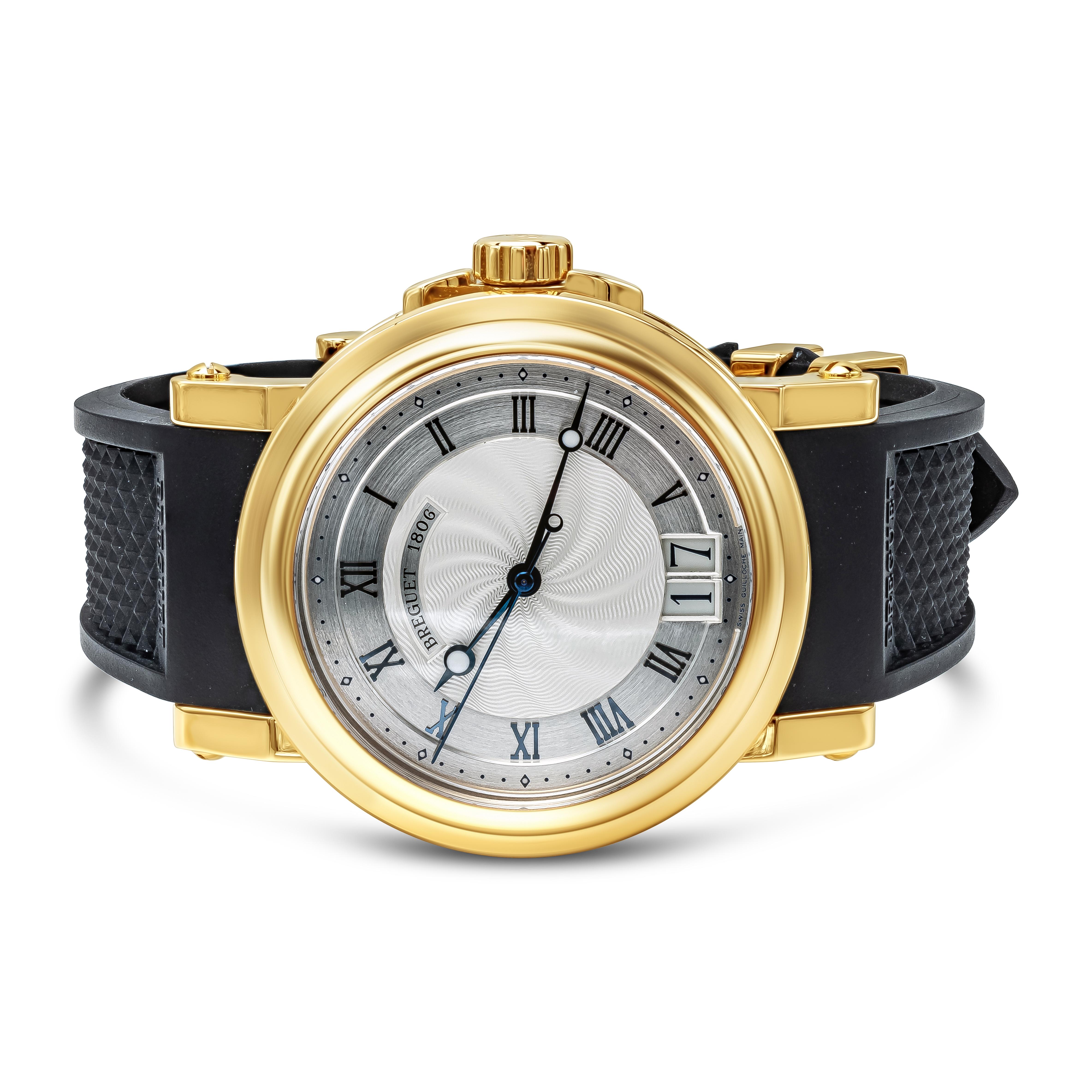 Breguet model 5817BA/12/9V8. Marine Model. Manufactured in 2012.
39mm 18k yellow gold case with sapphire crystal and caseback.
Silver guilloche dial with roman numeral hour markers and a date complication at the 6 o'clock position.
Automatic