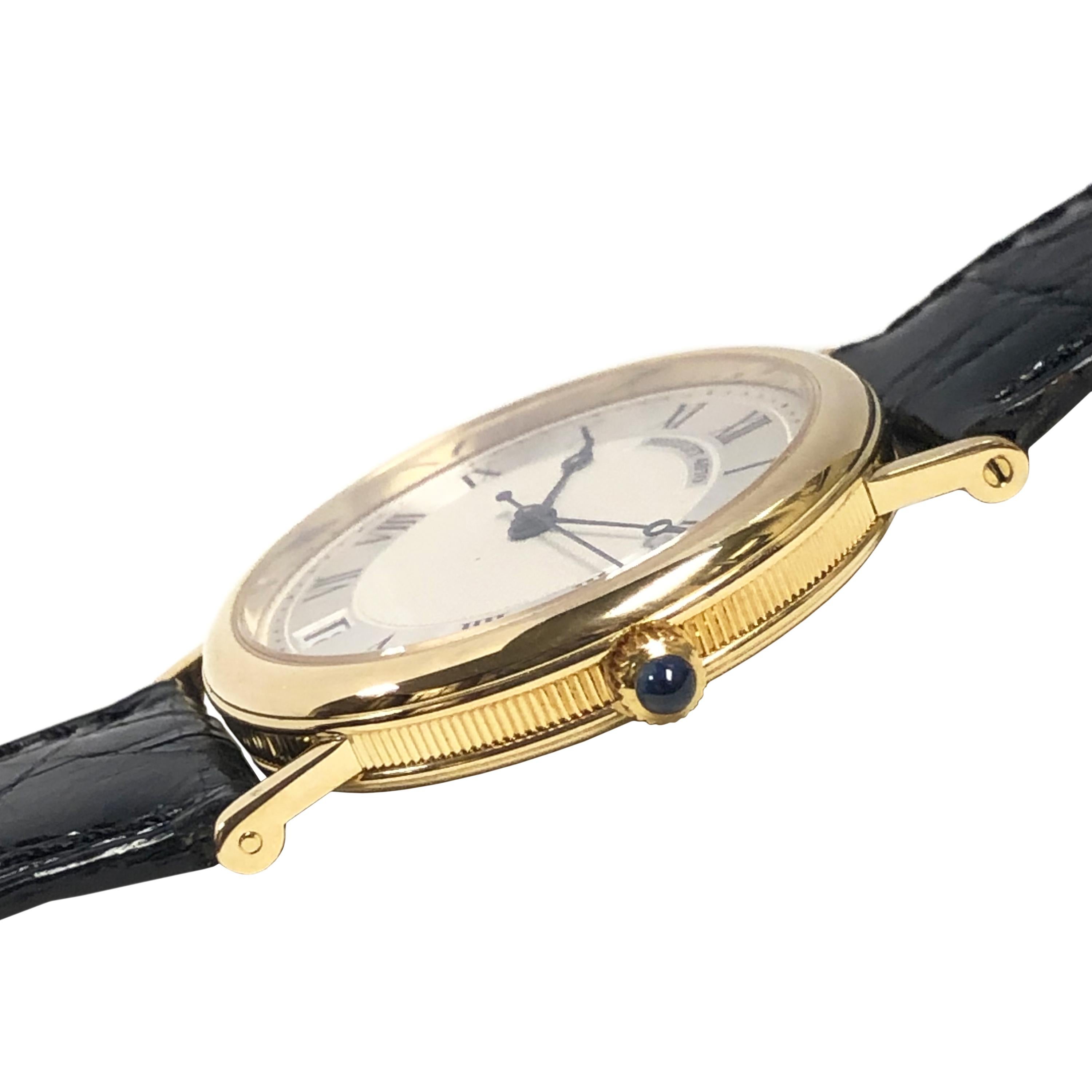 Circa 2000 Breguet Reference 3325 Wrist watch, 32.5 M.M. Diameter 18K Yellow Gold 3 piece case with Coin Edge. Sapphire Crown, Automatic, self winding movement, Silver Dial with White Textured waffle center, Black Roman numerals, Calendar window at