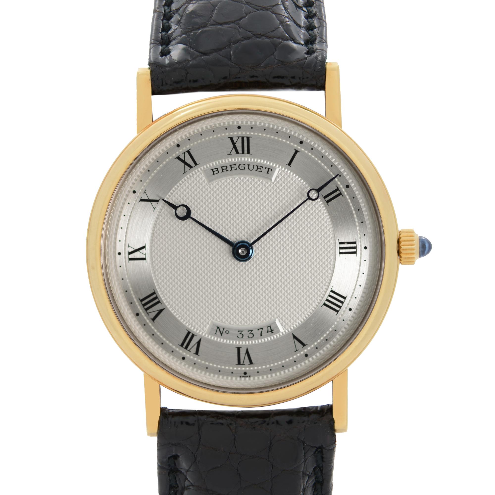 Pre-Owned Breguet Classique 33 mm 18k Yellow Gold Silver Dial Mens Hand-wind Watch 3500. The Watch is powered by an Automatic Movement and Features: Polished 18k Yellow Gold Round Case and Two-Piece Leather Strap. Fixed Gold Bezel. Silver Guilloche
