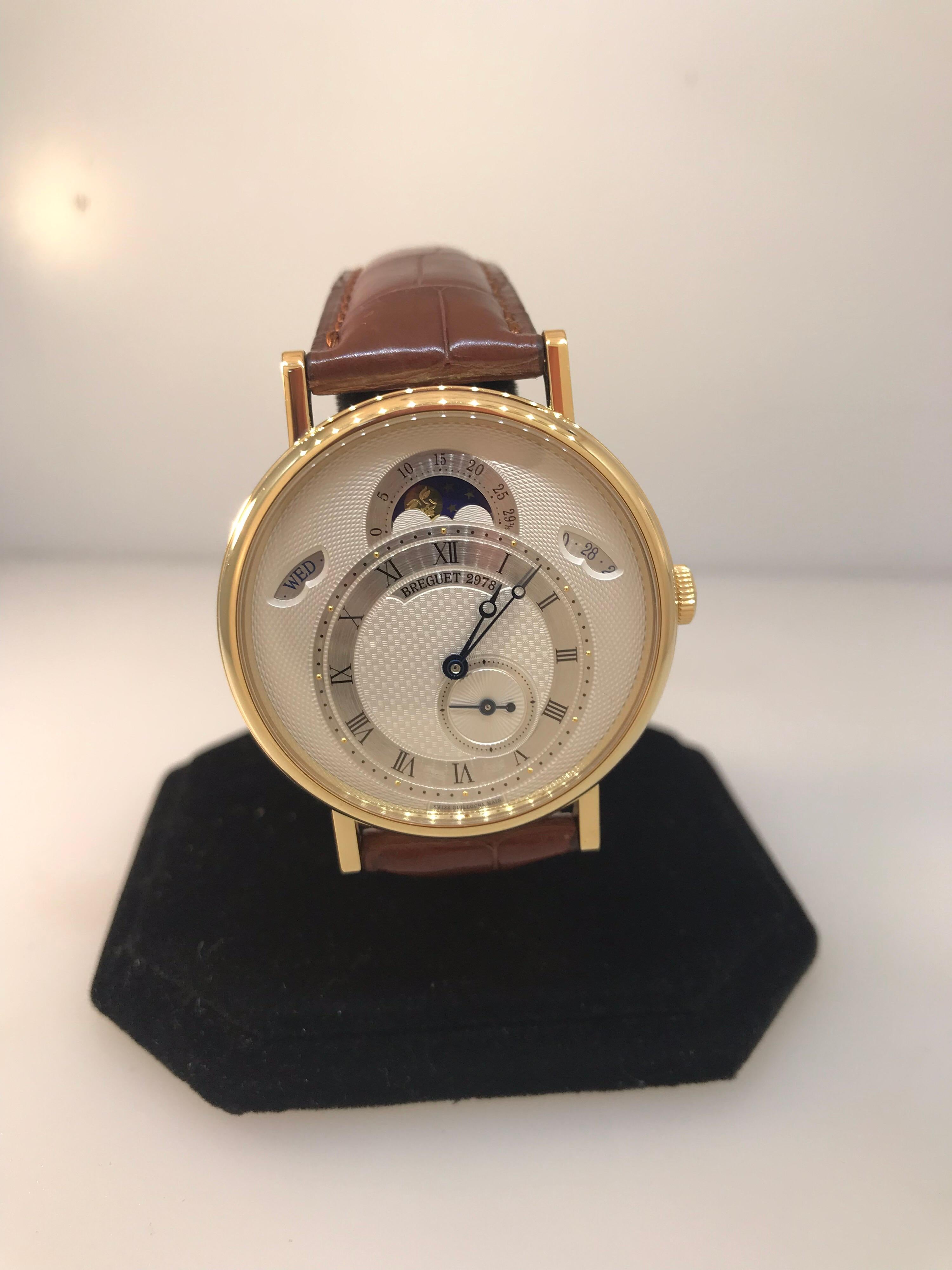 Breguet Classique Men's Watch

Model Number: 7337ba/1e/9v6

100% Authentic

Brand New

Comes with original Breguet box and papers

18 Karat Yellow Gold

Silver Dial

Case Diameter: 39mm

Swiss made automatic movement

Features: Day, Date,