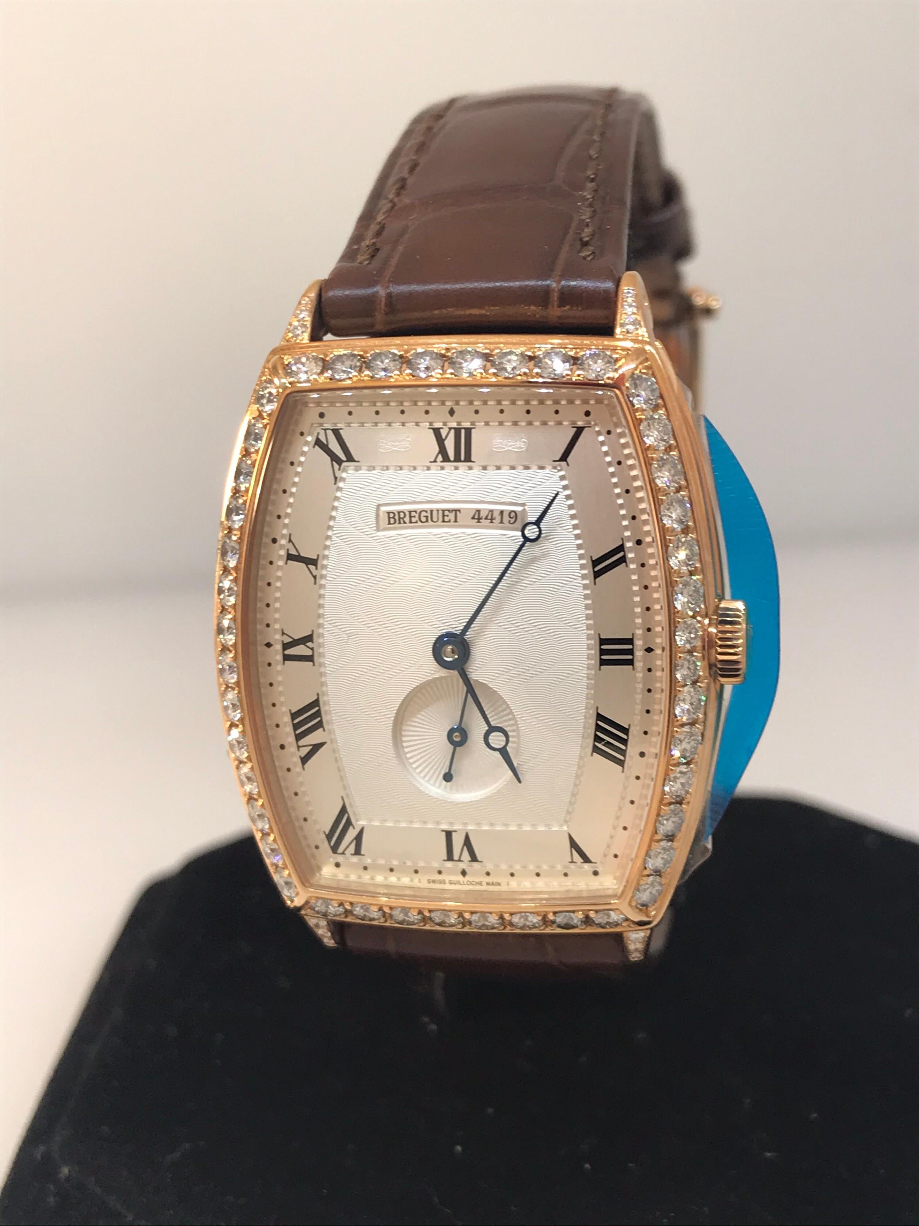 Breguet Heritage Men's Watch

Model Number: 3661BR12984DD00

100% Authentic

Brand New

Comes with original Breguet Box & Papers

18 Karat Rose Gold

Diamond Bezel (56 Diamonds 1.869 Carats)

Silver Dial

Roman Numeral Hour Markers

Case Dimensions: