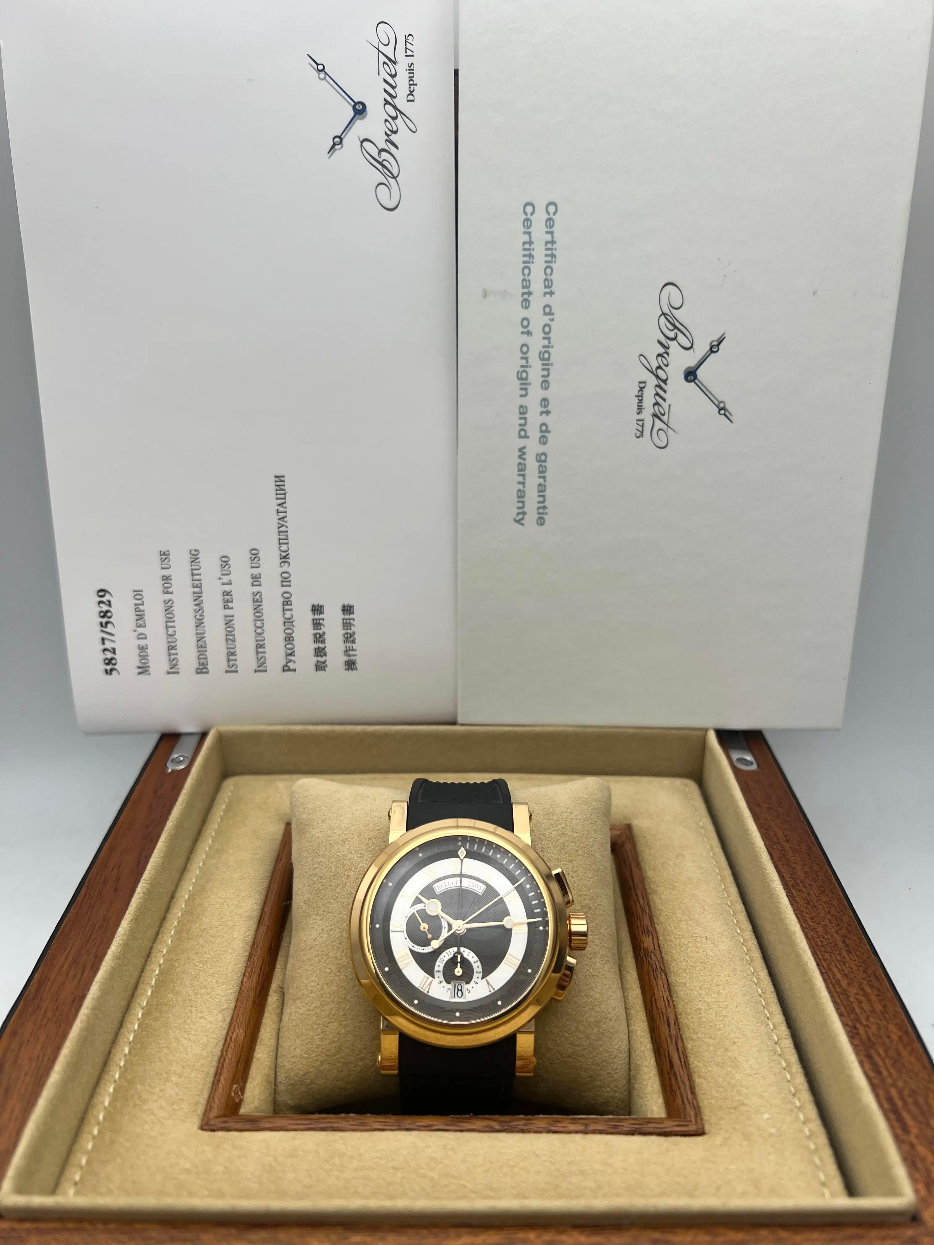 The Breguet Marine Chronograph 5827BR/Z2/5ZU is a refined and sporty timepiece that blends Breguet’s maritime heritage with luxurious design. Housed in a 42mm 18K rose gold case and fitted with a black rubber strap, it offers an elegant yet durable