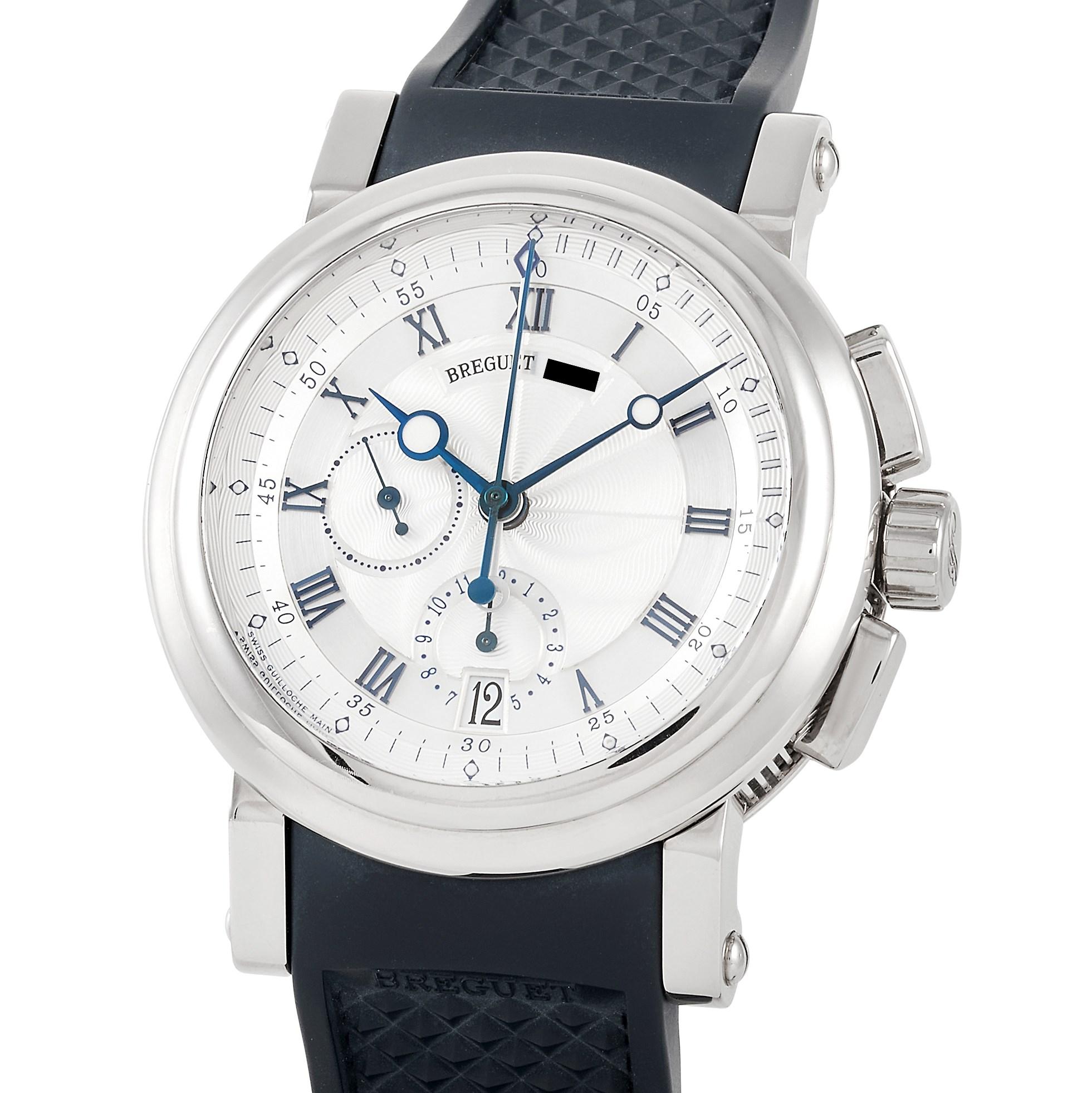 This Breguet Breguet Marine Royal Chronograph 48 mm Stainless Steel Watch, reference number 5827BB/12/5ZU, comes with a stainless steel case that measures 48 mm in diameter. The case is presented on a blue rubber strap. The transparent case back