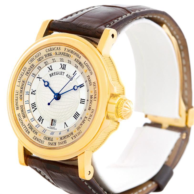 Breguet Marine World Time Hora Mundi 18K Yellow Gold Watch. Model 3700. Automatic self-winding movement. Rhodium-plated, fausses cotes decoration, 36 jewels, straight-line lever escapement, monometallic balance, shock absorber, self-compensating