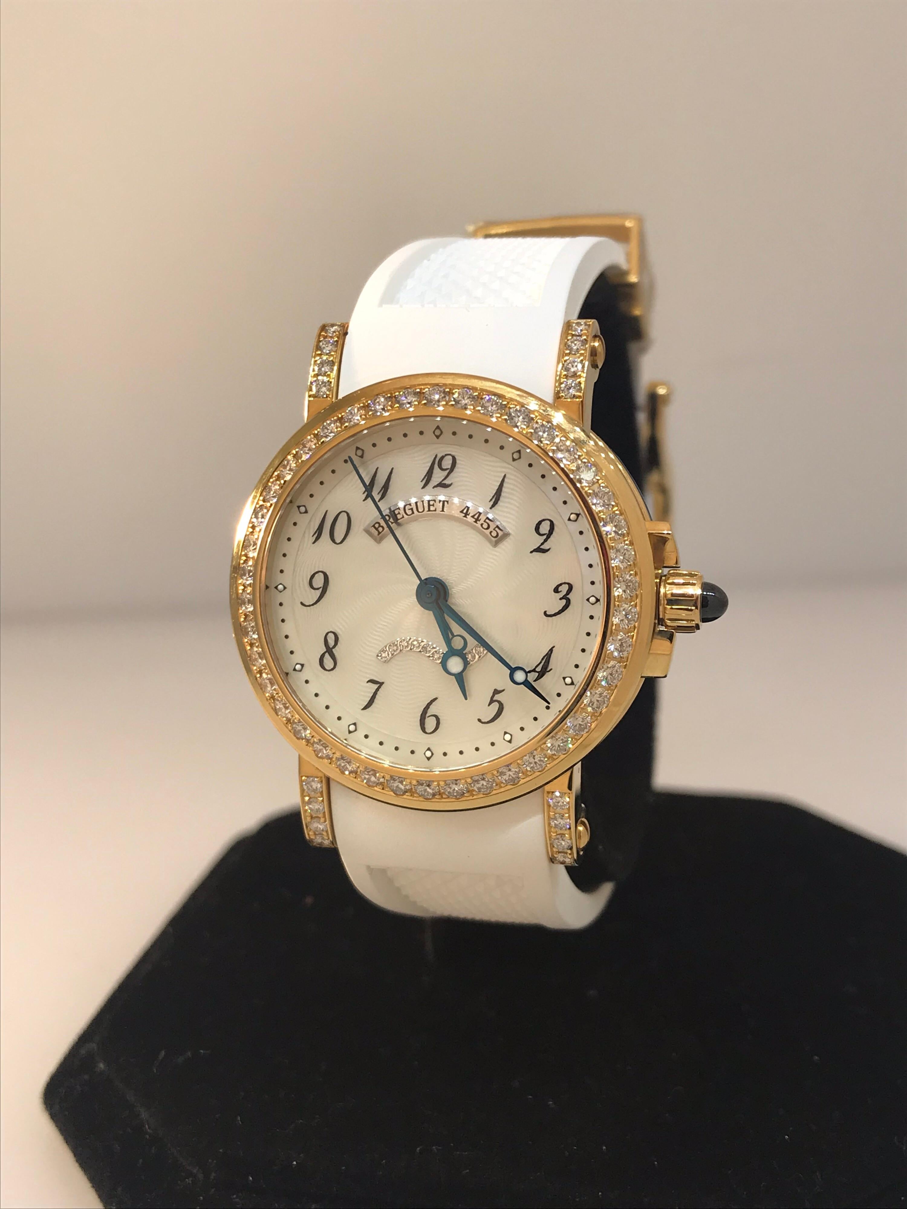 Breguet Marine Ladies Watch

Model Number: 8818ba/59/564.dd00

100% Authentic

Brand New

Comes with original Breguet Box and Papers

18 Karat Yellow Gold Case & Buckle

Bezel and lugs set with 58 diamonds (1.25 Carats)

White dial set with 10