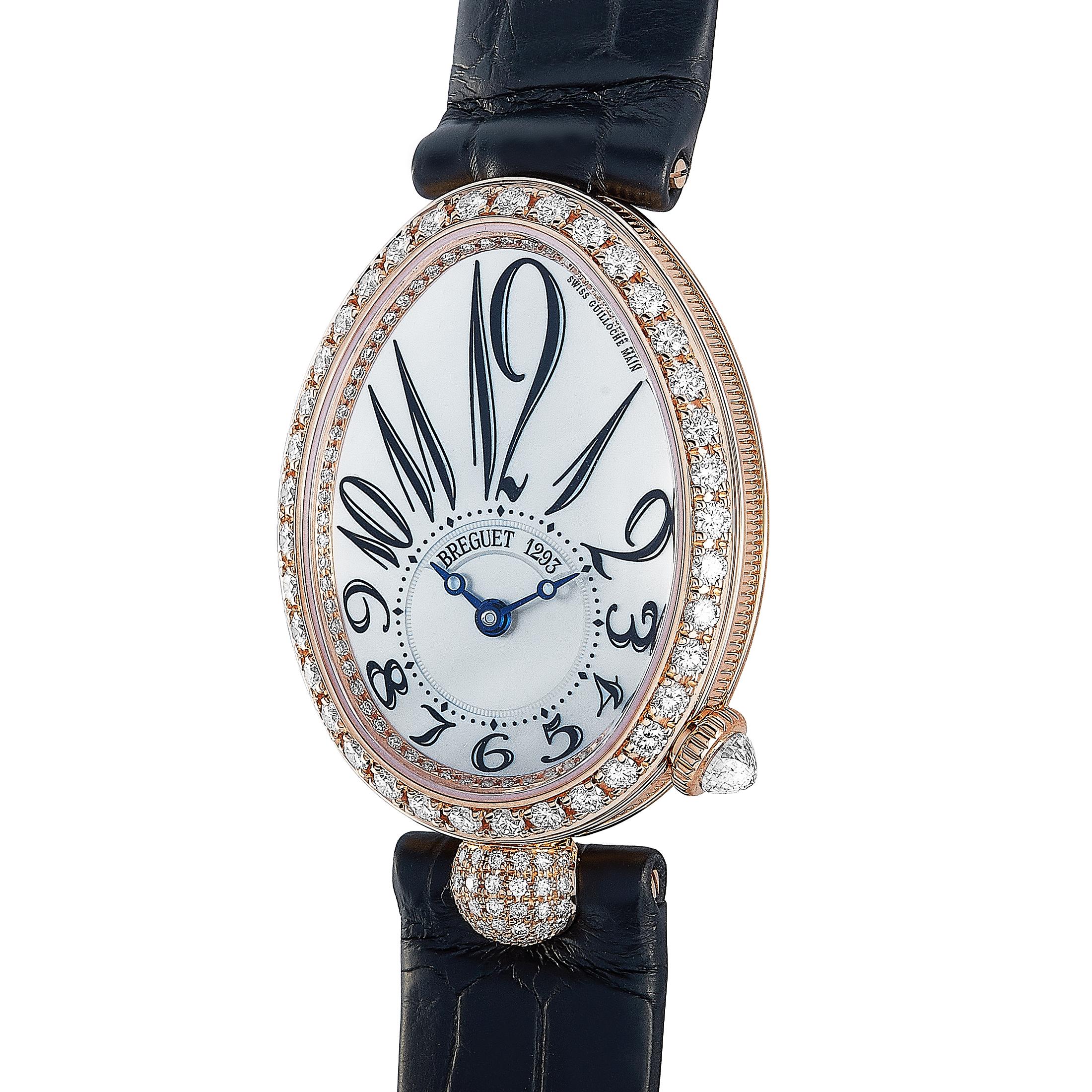 The Breguet Reine de Naples 8928 watch, reference number 8928BR/5W/944 DD0D, is presented within the sublime “Reine de Naples” collection.

This timepiece boasts a diamond-set 18K rose gold case that is mounted onto a black leather strap, secured on
