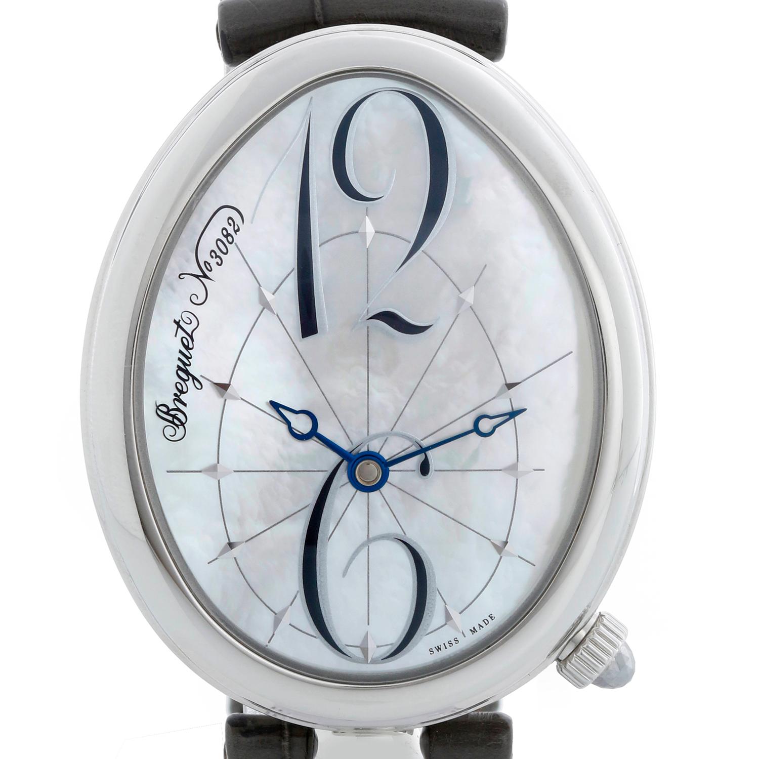Breguet Reine de Naples 8967 Mother Of Pearl  Ladies Watch - Automatic winding. Stainless steel case with exposition back (44 x 35 mm). Mother of pearl dial with Breguet Arabic numerals at 12 and 6 o'clock. Green Breguet leather Strap with Breguet