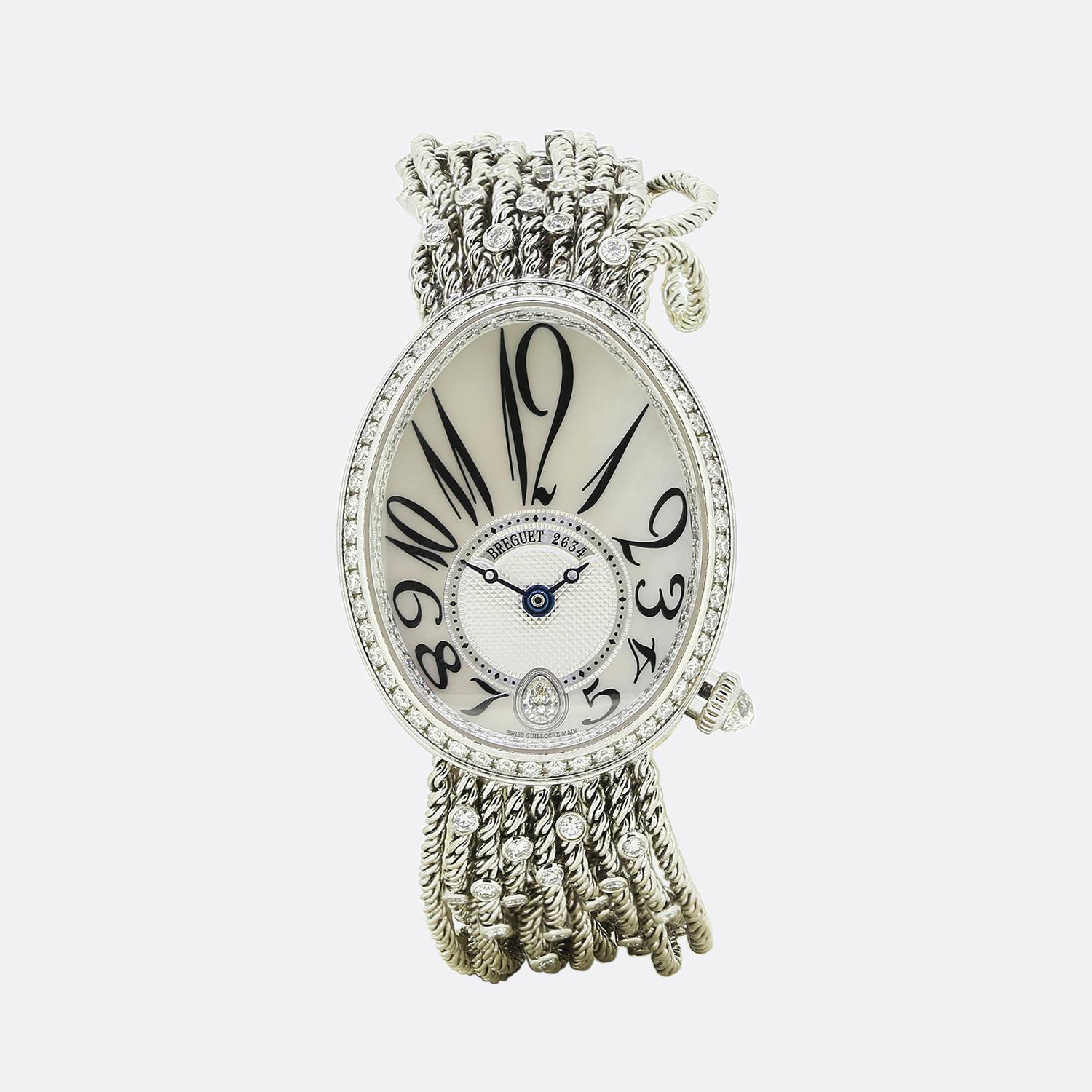 This is a stunning 18k white gold Breguet ‘Reine de Naples’ diamond wristwatch. The watch features a mother of pearl dial and a sub dial in 18k white gold with a fine guilloche textured pattern,black printed dot minute track and blue steel Breguet