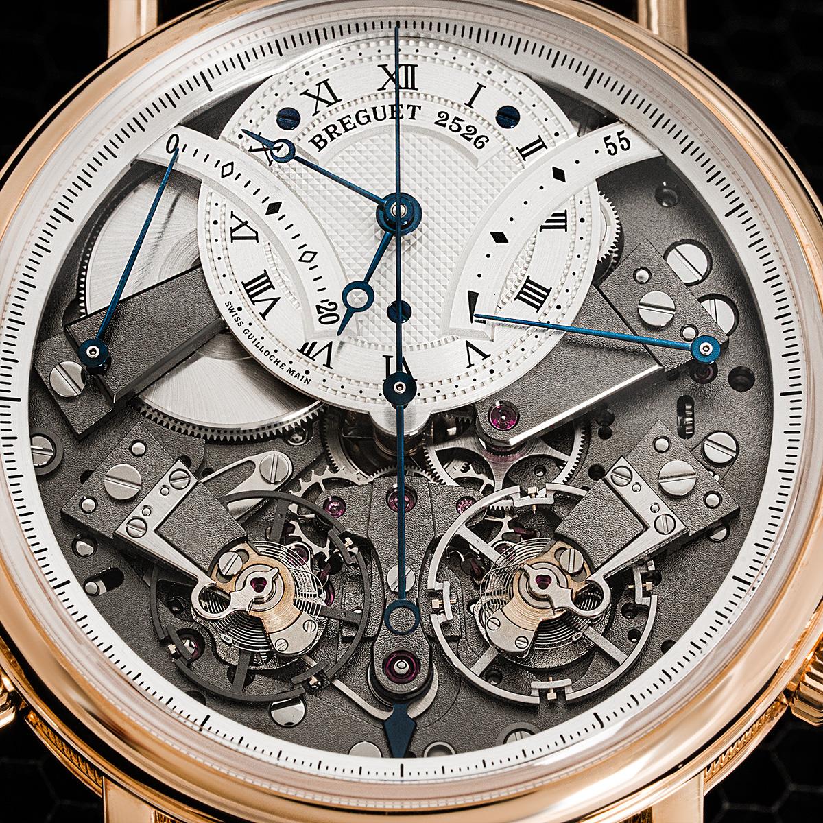 A 44m rose gold Tradition wristwatch by Breguet. Featuring a silver guilloche dial with an open face design, which allows you to see the inner mechanical movements of the watch. The watch also features a power reserve display, a 20-minute counter