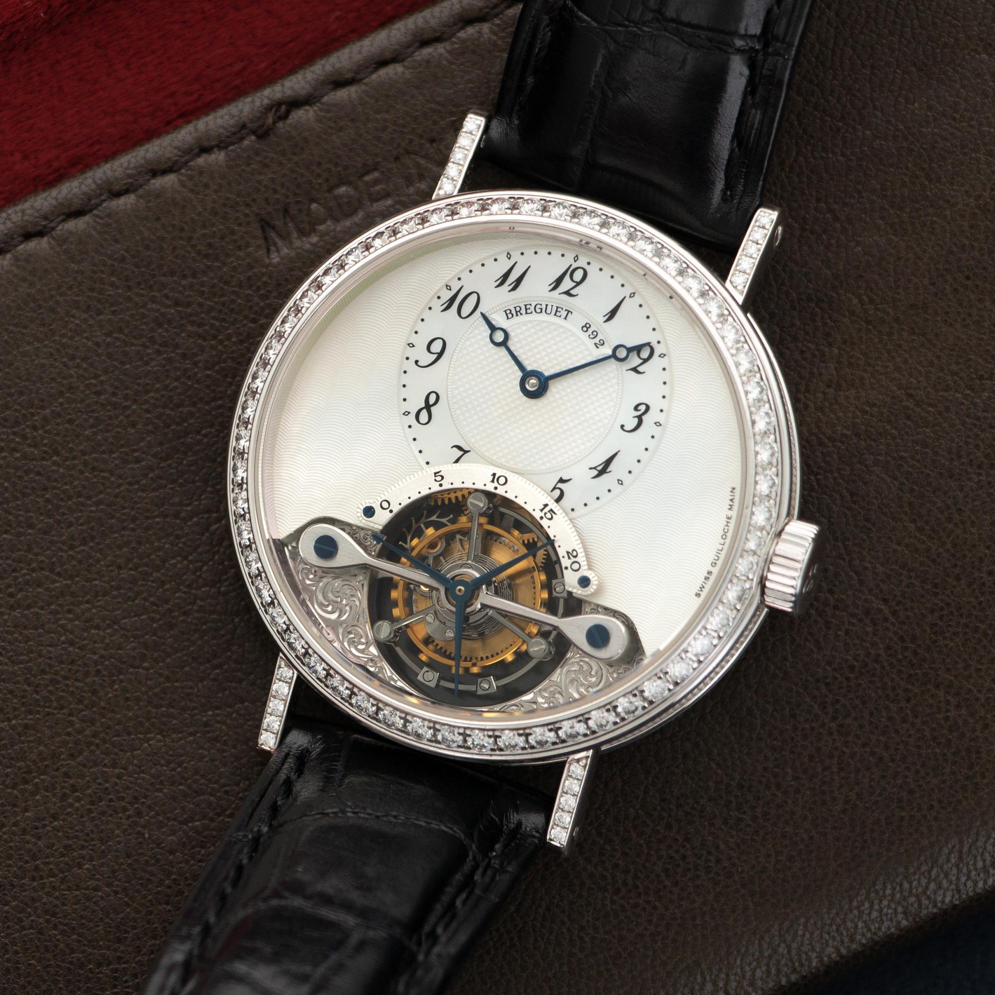 An 18k White Gold Breguet Classique Tourbillon Diamond Watch. Model Number 3358BB/52/986.DD00. 35mm Case Diameter. Mechanical Movement. Mother of Pearl Dial. Comes in its original Box. Retails for $113,500.
