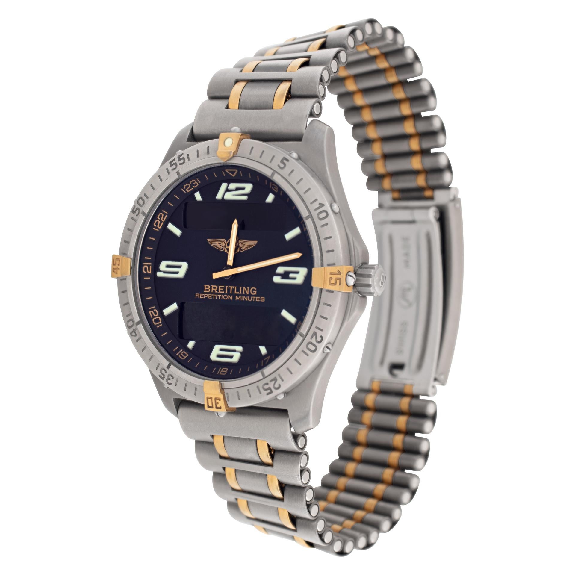 Breitling Aerospace in titanium and gold plated accents. Quartz with digital and analog display. 40 mm case size. Ref F65632. Fine Pre-owned Breitling Watch. Certified preowned Sport Breitling Aerospace F65632 watch is made out of Titanium on a