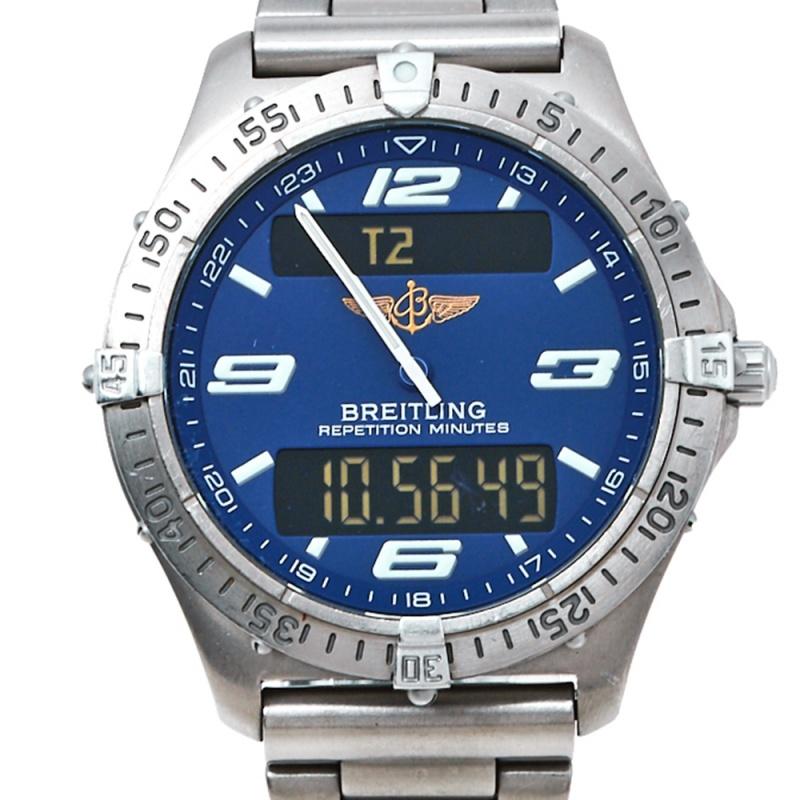 First introduced in 1985, Aerospace is a star design from the luxury watch brand, Breitling. This style E6536210/C292 is rendered in titanium and features a 40mm case that carries an engraved bezel. The round, blue dial is designed with Arabic