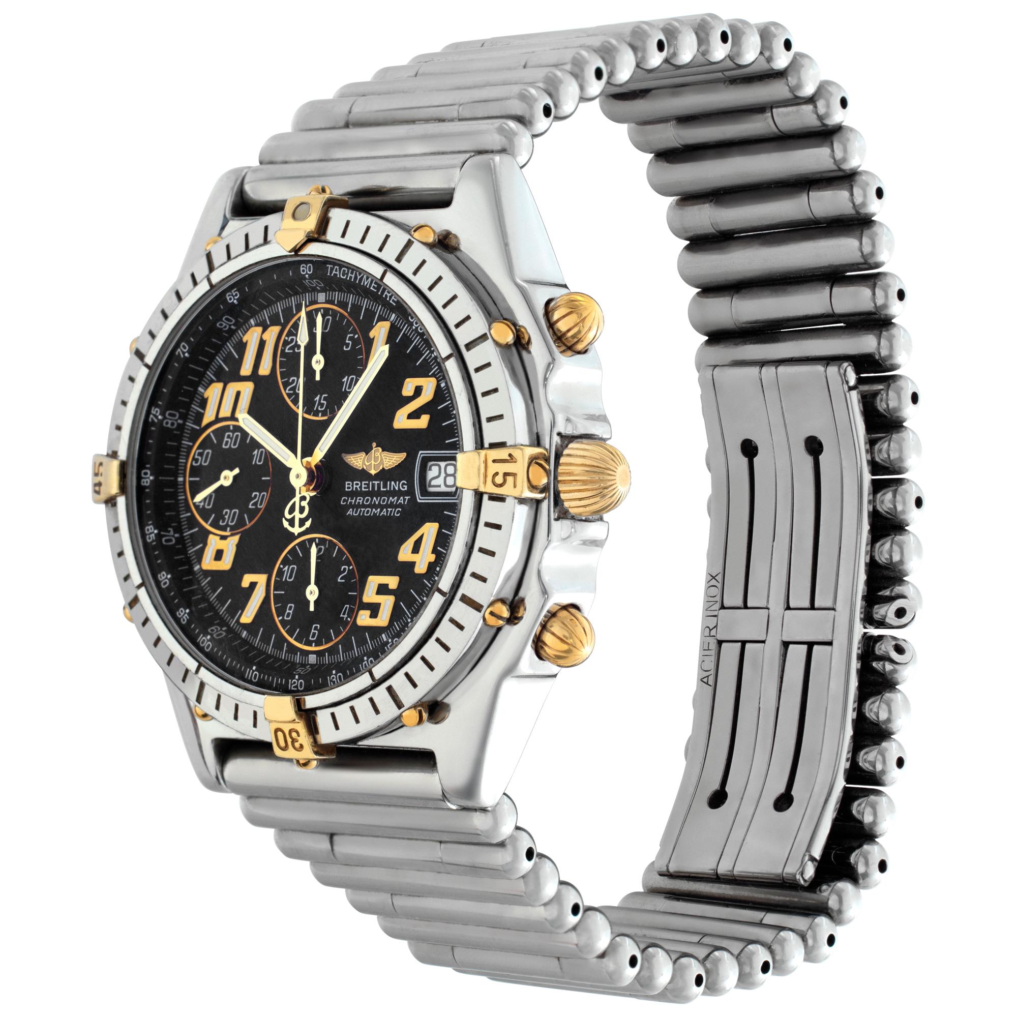 Breitling Chronomat in stainless steel with gold riders, chrono pushers and crown with black dial set with Arabic hour markers. Auto w/ sweep seconds, date and chronograph. 38 mm case size. With box and papers. Ref B1350.1. Circa 2020. Fine