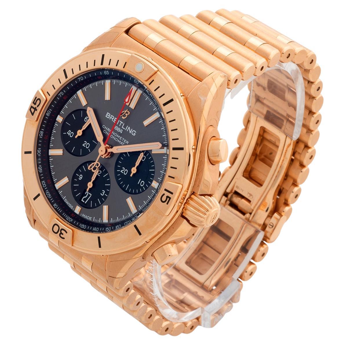 Our rare and desirable Breitling Chronomat 42 Chronograph RB0134101B1R1 features a 18k rose gold case and 18k rose gold 'rouleaux' bracelet, and dark grey dial, making for a very attractive combination. This reference is also known for being an