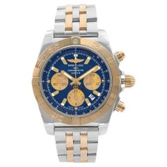 Breitling Chronomat 44 18K Yellow Gold Steel Blue Dial Mens Watch CB0110121C1C1