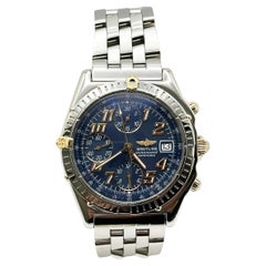 Breitling Chronomat B13050.1 Blue Dial 18K Yellow Gold Stainless Steel Box Paper