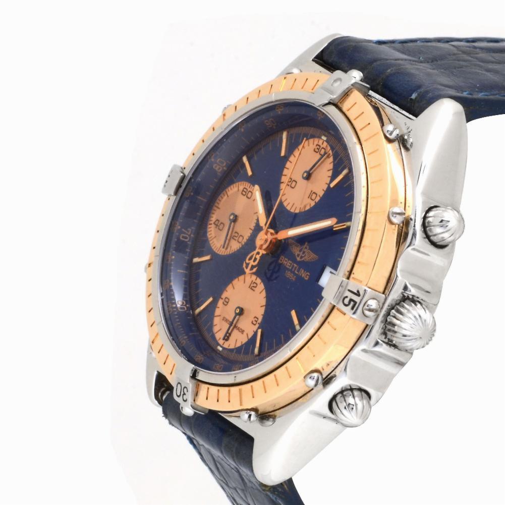 Breitling Chronomat Reference #:C13047. Breitling Chronomat C13047 Men's Automatic Watch 18K Rose gold Blue Dial 40MM. Verified and Certified by WatchFacts. 1 year warranty offered by WatchFacts.
