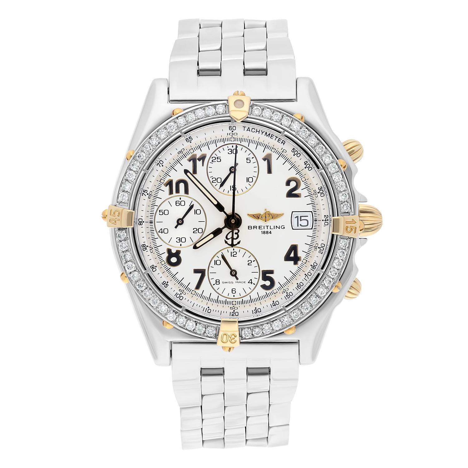 Brand: Breitling 
Series: Chronomat  
Model: B13050
Case Diameter: 39 mm
Bracelet: Stainless steel
Bezel: YG, Custom diamond set
Dial: Cream dial
The sale includes a jewelry watch box and an appraisal certificate which states the watch's