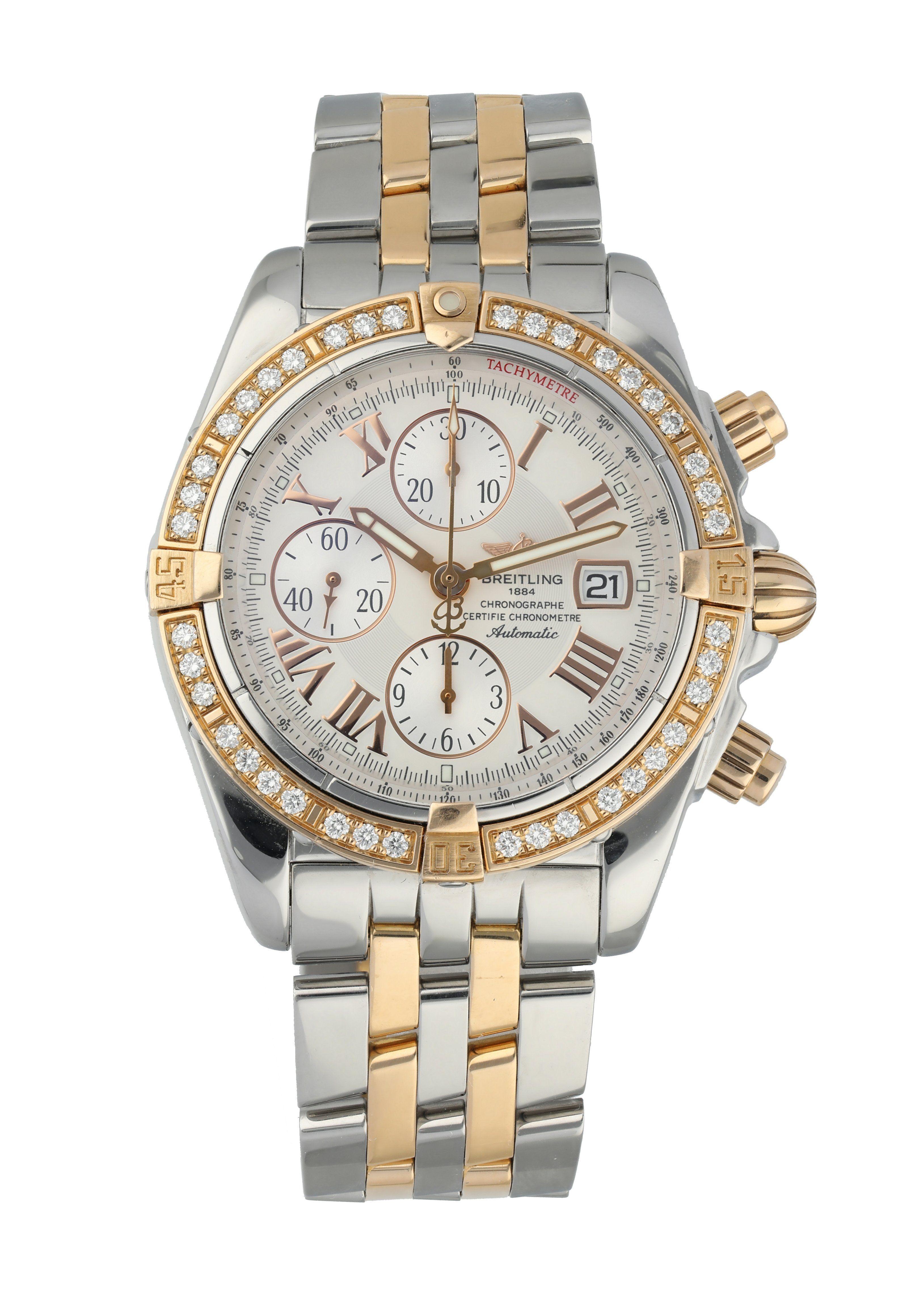 Breitling Chronomat Evolution C13356 Men's Watch. 
44mm Stainless Steel case. 
Factory diamond bezel in 18k Rose Gold.  
Silver dial with gold hands and Arabic numeral hour markers. 
Minute markers on the outer dial. 
Date display at the 3 o'clock
