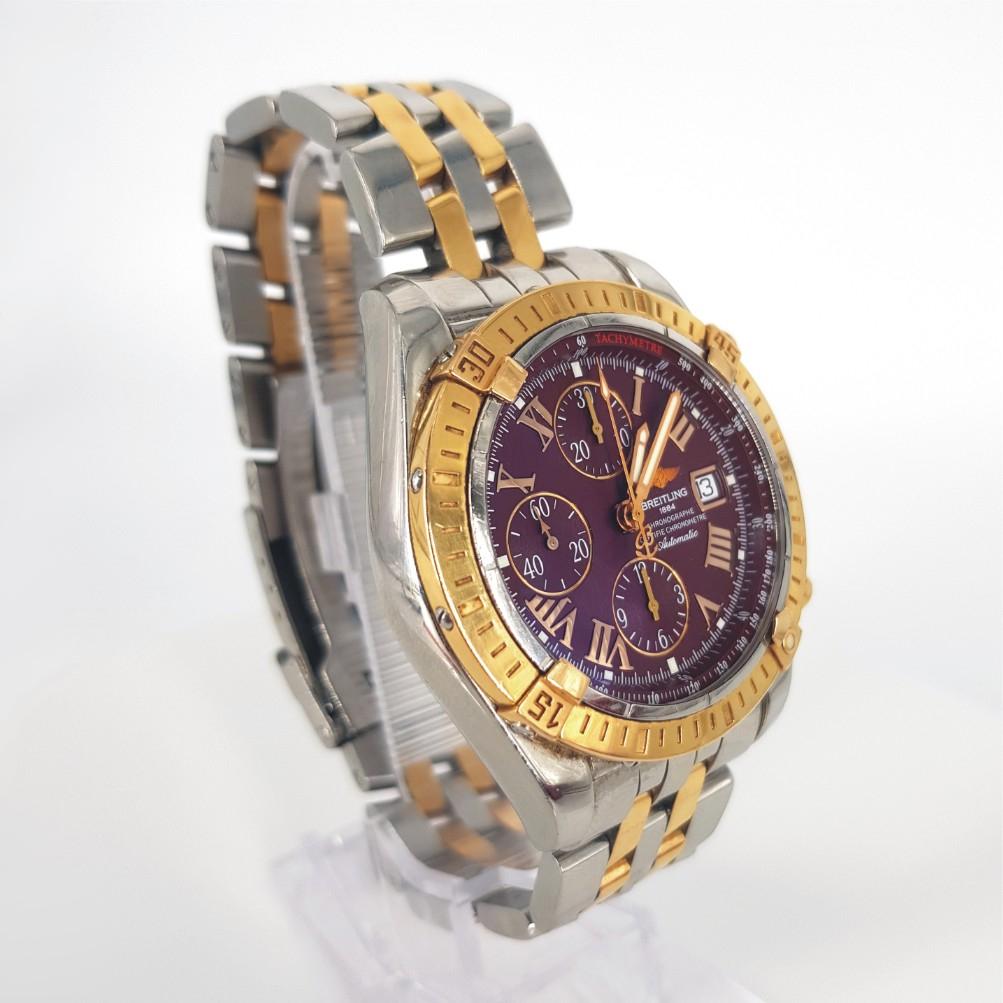 Breitling Chronomat Evolution Uhr - Automatik in ausgezeichnetem Zustand. 
Modell-Nummer: C13356 
Jahr: 2000 - 20009
Edelstahlgehäuse & Gold Messung 42mm mit einem kastanienbraunen Zifferblatt & Edelstahl & Gold Armband Messung 59mm.

