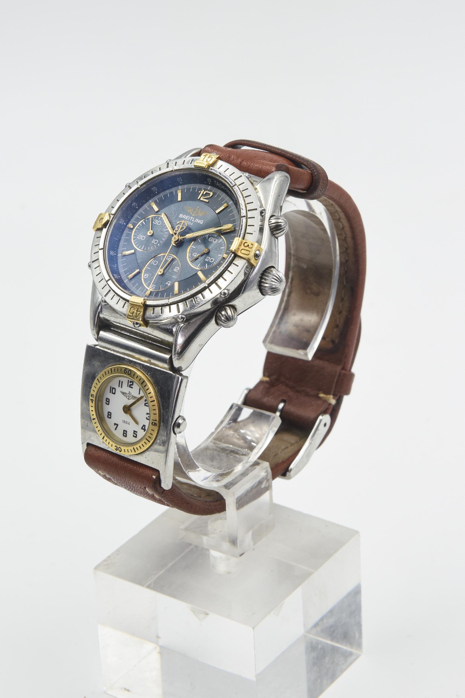 Breitling Chrono Cockpit Blau - Graues Zifferblatt

Breitling, Chrono Cockpit, Referenz: B30011, Edelstahl und 18 Karat Gelbgold an einem braunen Lederband mit Edelstahlschließe.  Die Merkmale umfassen:  Automatisches Uhrwerk, einseitig drehbare