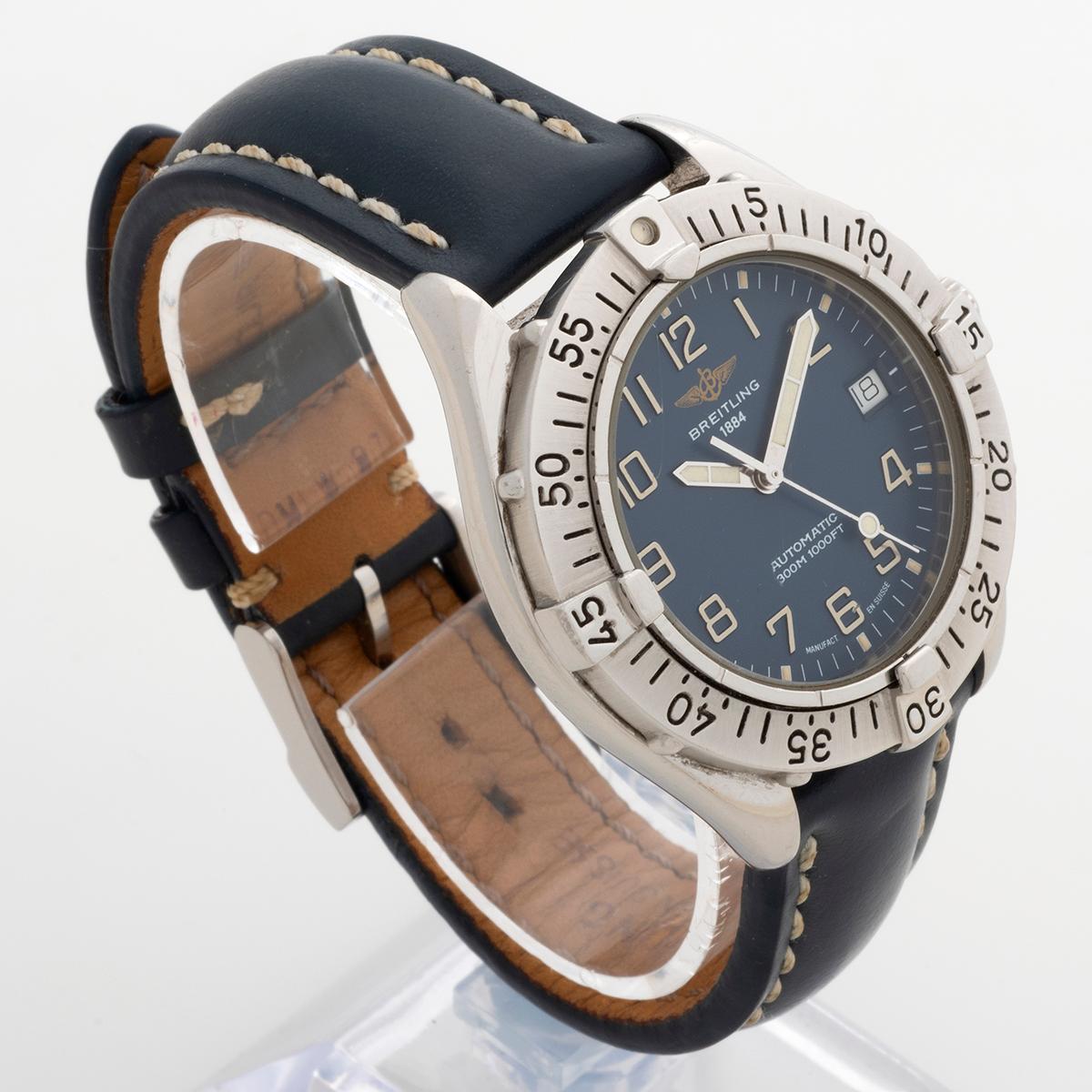 Our neo vintage Breitling Colt Automatic reference A17035 features a 38mm stainless steel case (exc crown and crown guard) rare blue dial and is fitted to a blue Breitling signed strap with Breitling tang buckle, the strap and tang buckle do both