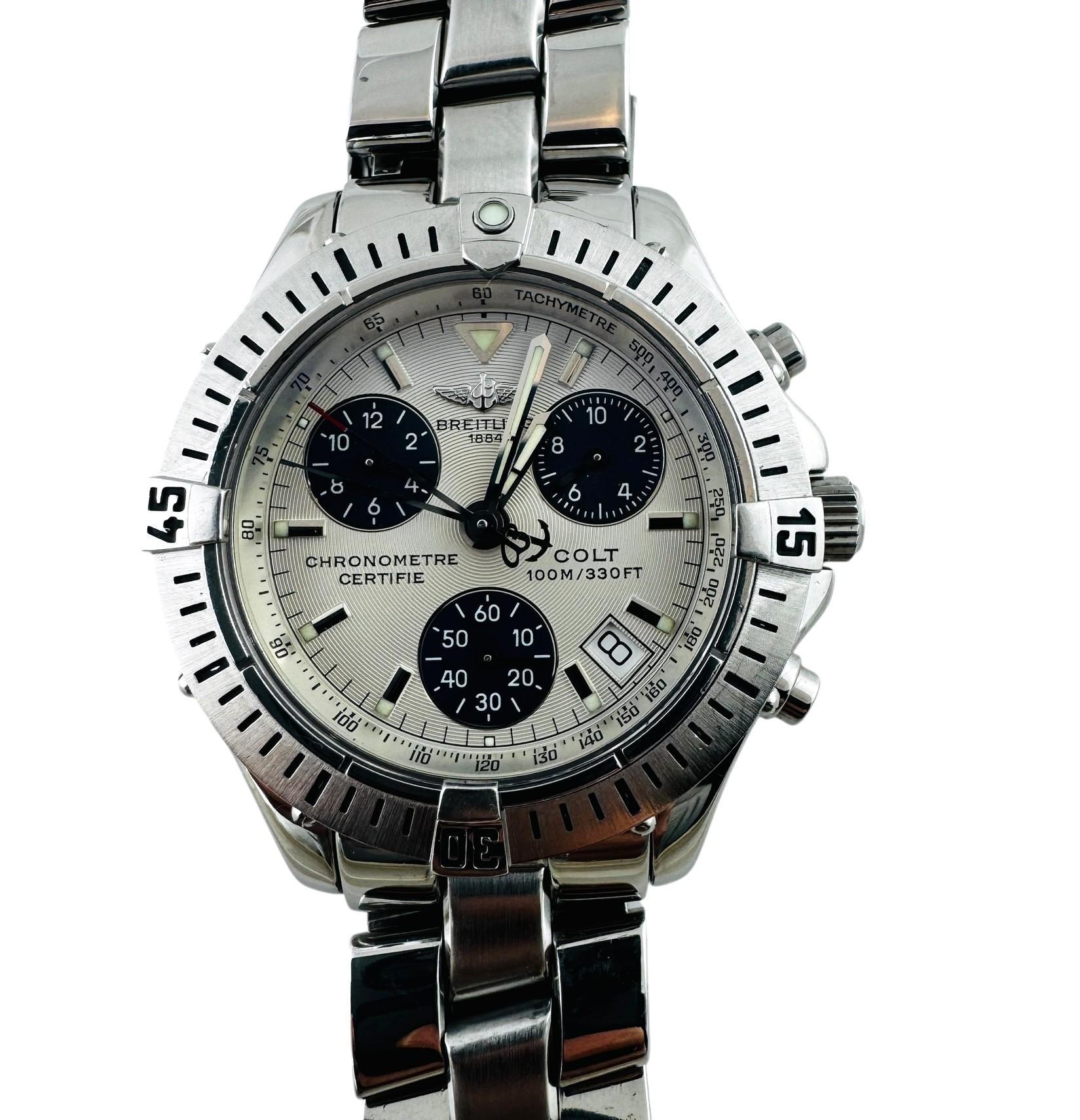 Breitling Colt Chronograph Watch

Model: A73350
Serial: 374469

This Breitling Colt watch is set in stainless steel

Silver Dial with blue accents

Stainless steel case is 38mm in diameter

Stainless steel band is in very good condition. Fits up to