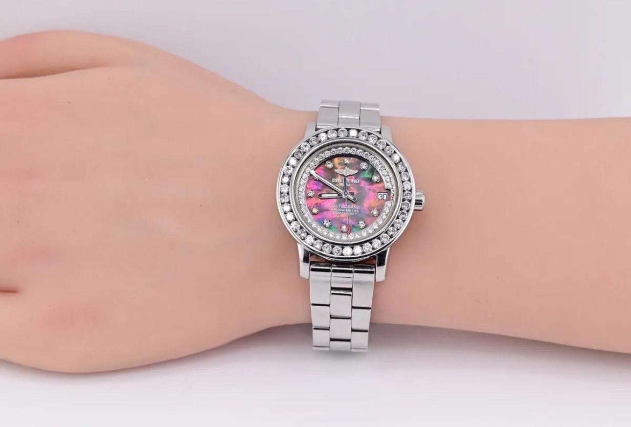 Be a part of the luxury watch community with this stunning Breitling Colt Ocean 32mm ladies' wristwatch. The watch features a silver case and bracelet with a black mother of pearl dial. The baton indexes and luminous hands make it easy to read the