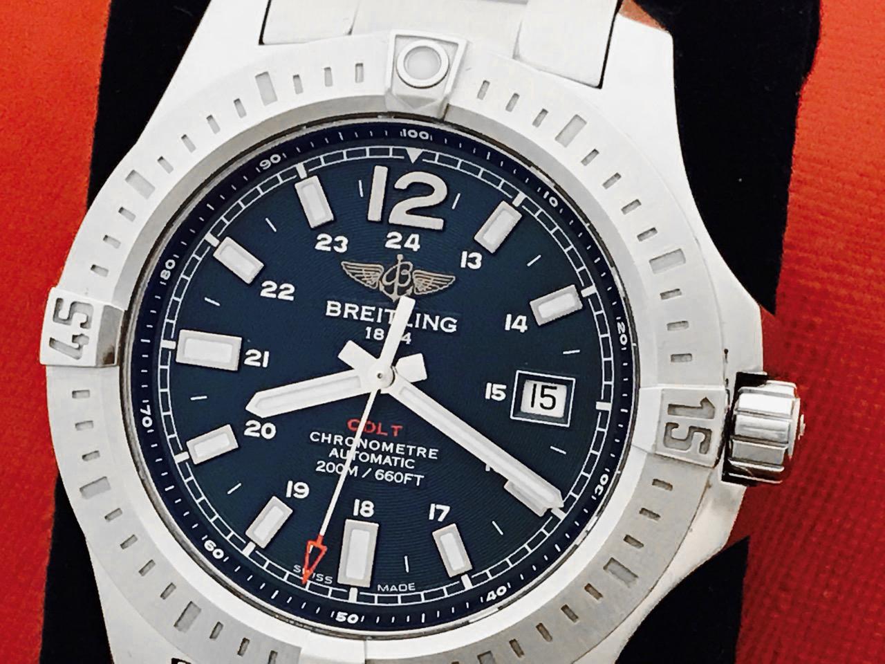As New Breitling Colt Mens Wristwatch Model A1738811/C906-SS. Slate Blue 24 hour Dial with luminous hour markers. Stainless Steel case (44mm). Water Resistant to 220 Meters - 660 Feet. Stainless Steel Breitling bracelet with flip-lock clasp.