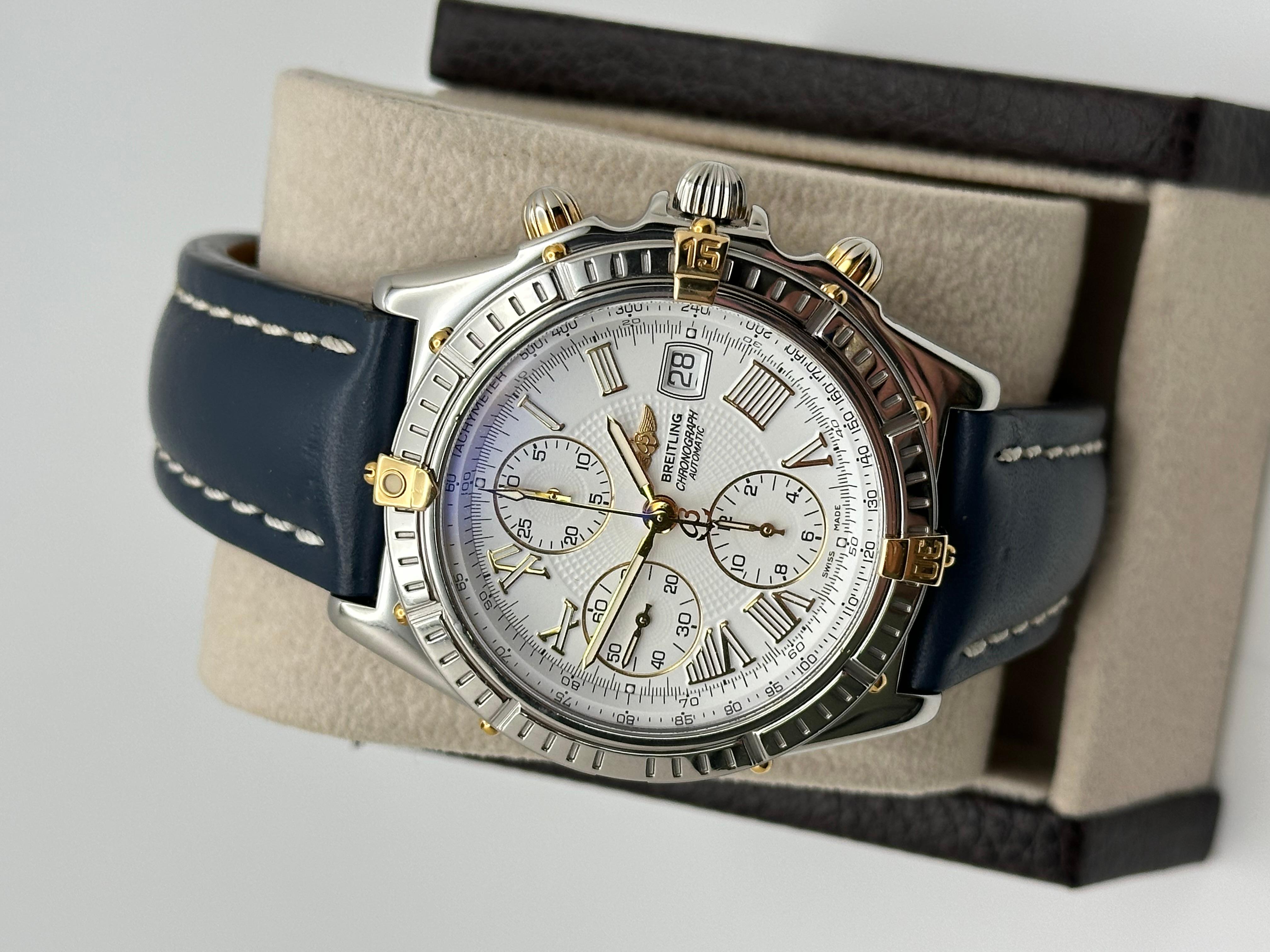 Breitling Crosswind B13055 Weißes Zifferblatt Stahl 18K Gelbgold Blaues Riemen Box Papier Herren