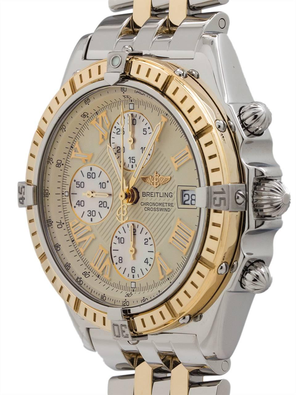 
Contemporary Breitling Crosswind ref# D13355, oversize self winding chronograph circa 2003. Featuring a 43mm diameter steel and gold case with uni-directional elapsed time bezel, and non reflective sapphire crystal. Featuring a beautiful cream dial