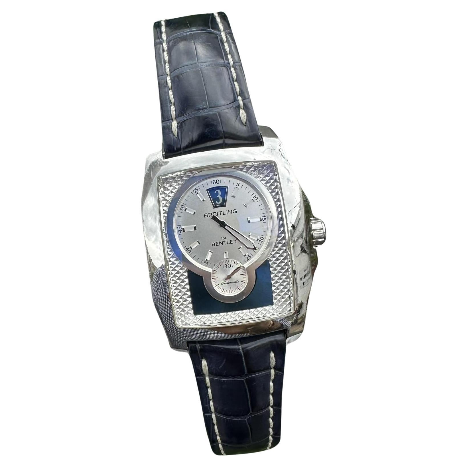 Watchmaker: Breitling
Model: Bentley Flying B - Ref. A28362
Movement: Automatic - Self Winding
Case Material: Stainless Steel
Case Width: 38.5mm (not counting the crown)
Case Height: 57.2mm (measuring from both ends of the diamond tails)
Case