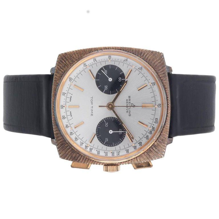 BREITLING - a gentleman's Top Time chronograph wrist watch. Gold plated case with stainless steel case back. Reference 2009, serial 1104545. Signed manual wind Venus calibre 188. Silvered dial with baton hour markers, subsidiary recorder dials to