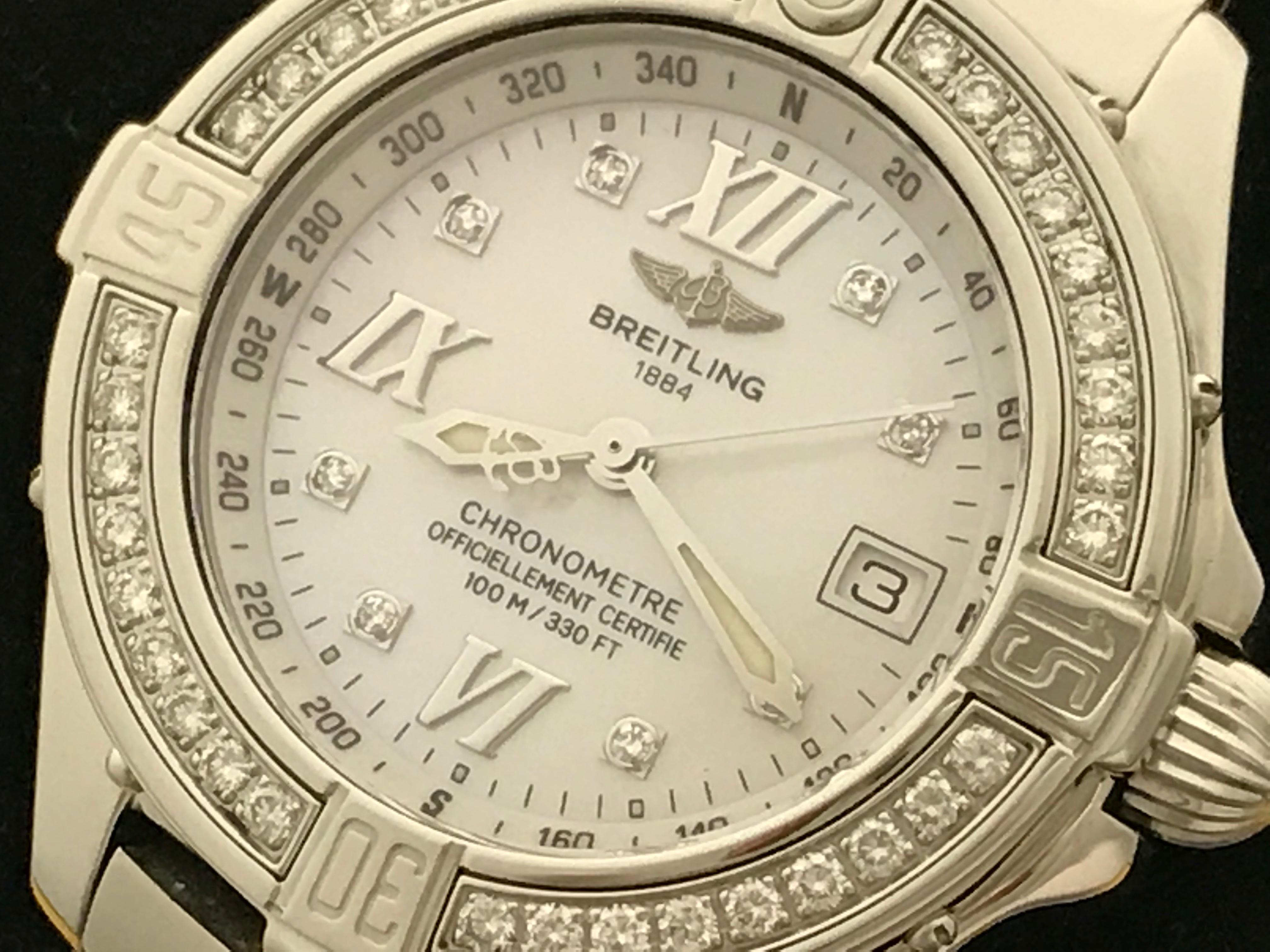 Breitling Cockpit Lady pre-owed quartz wrist watch with date. Model A67365. Breitling Mother of Pearl Dial with Diamond hour markers and Roman numerals, Stainless Steel case with rotatable diamond bezel (31mm dia.) Stainless Steel Breitling Lady