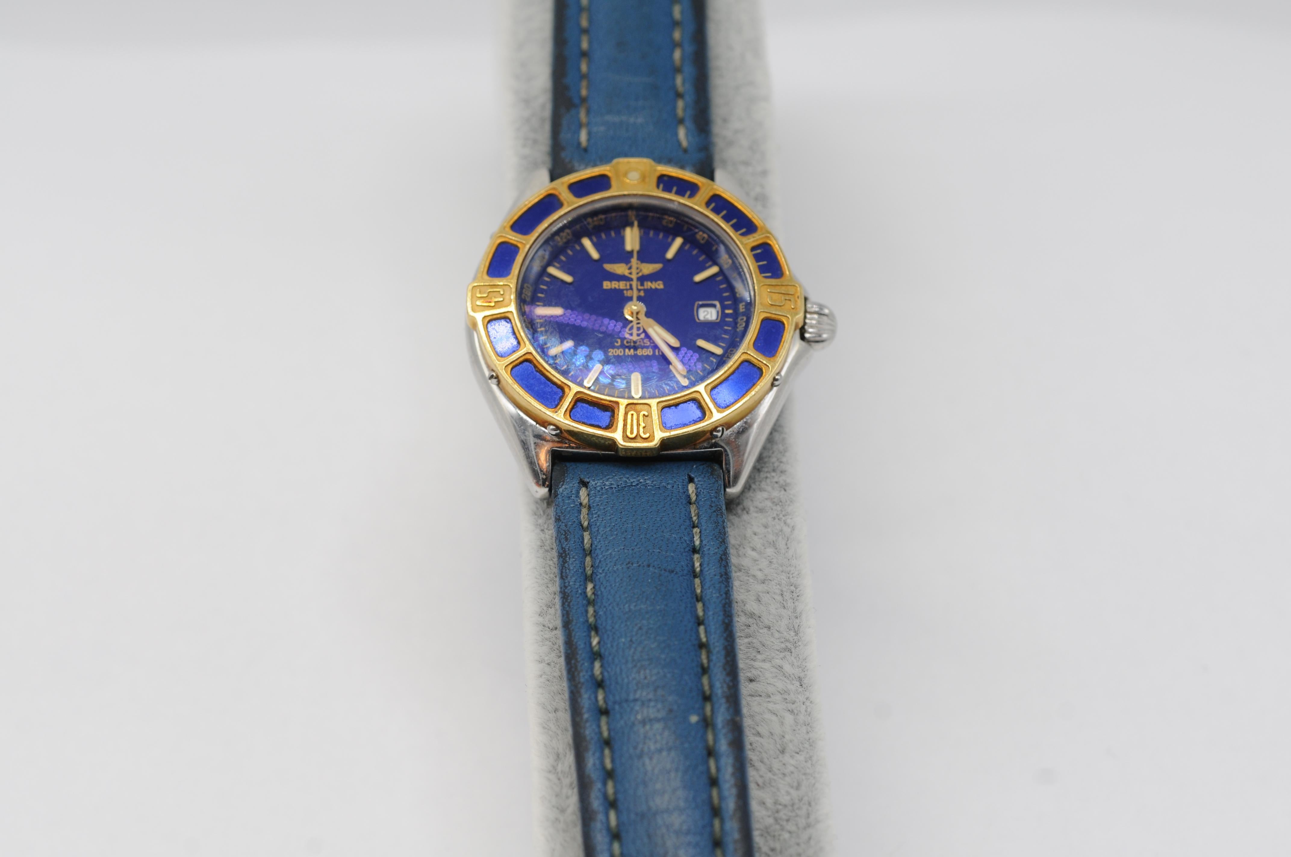 Women's or Men's Breitling Lady J D52065 with a deep blue leather strap For Sale