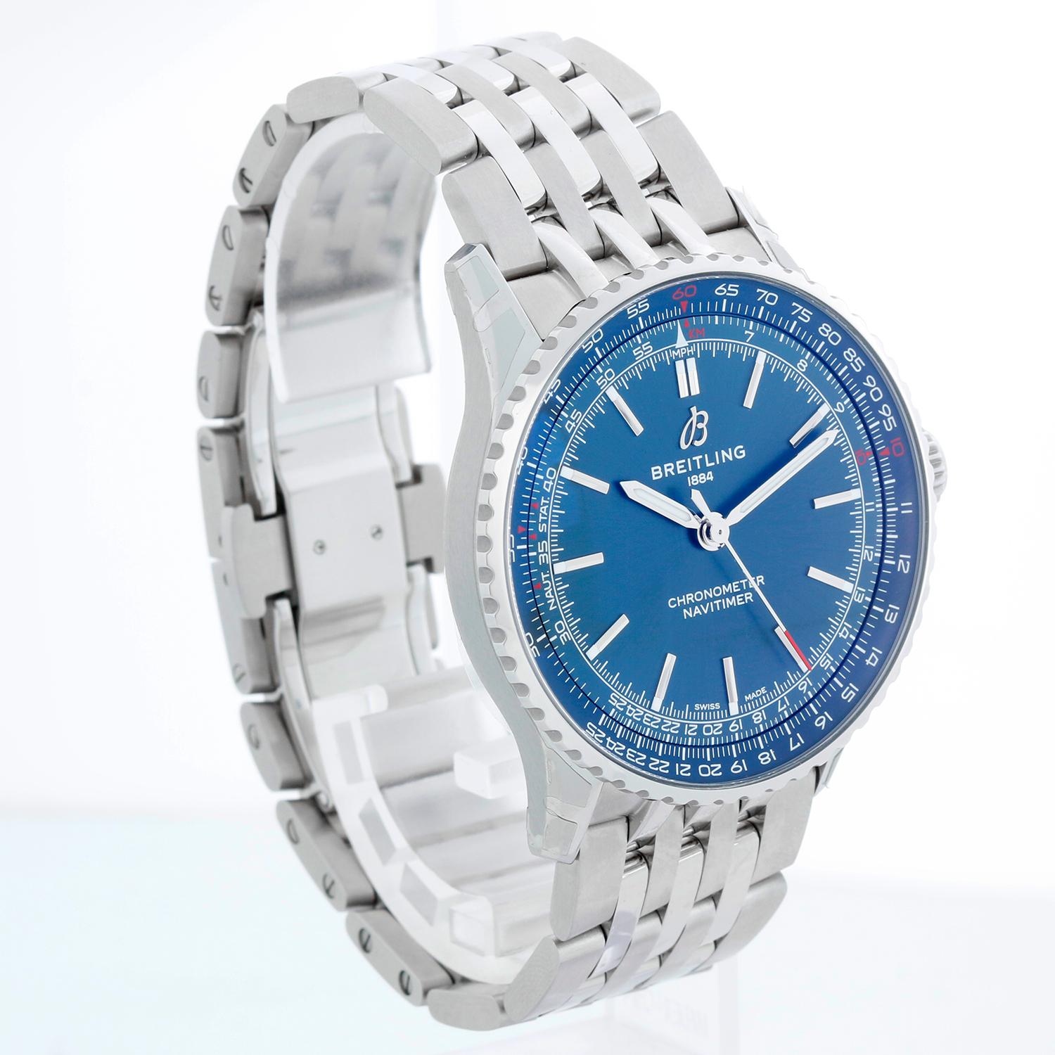 Breitling Navitimer Automatic 41 Men's Stainless Steel Watch A17329 - Automatic winding, Caliber Breitling 17. Stainless steel case (41mm) with rotating bezel. Blue dial with 24 hour scale. Stainless steel Breitling bracelet with 2 push deployant;