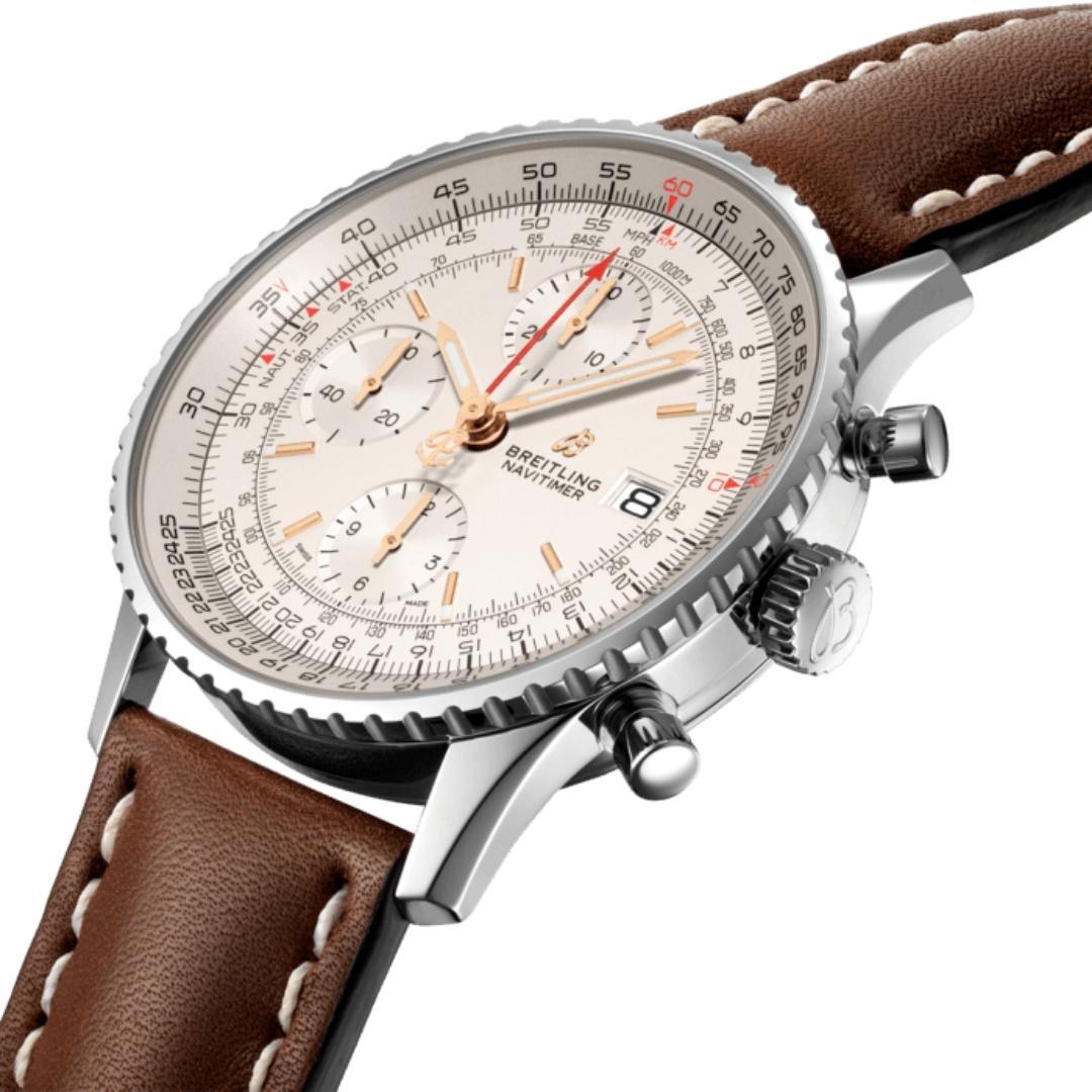 Breitling Navitimer Chronograph 41 automatic watch. 41mm stainless steel case with ivory dial and sub-dials and glare-proof sapphire crystal. Brown calfskin leather strap. 30m WR.