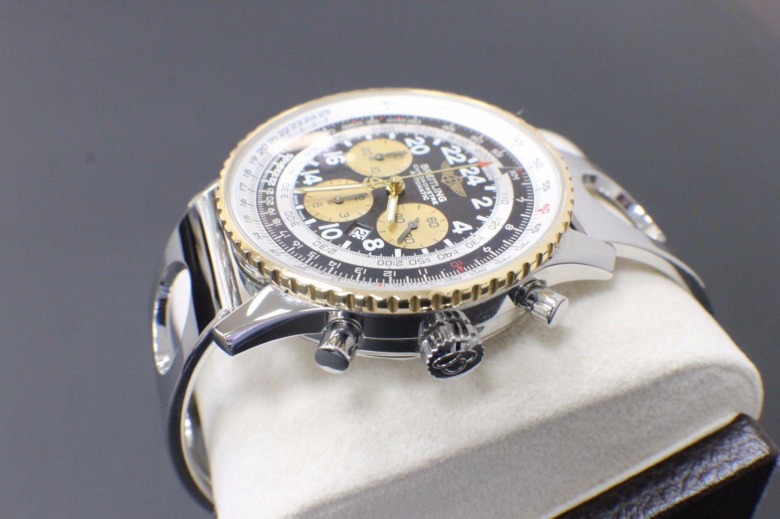Style Number: D22322 

Model: Navitimer Cosmonaute

Case Material: Stainless Steel 

Band: Stainless Steel

Bezel: Stainless Steel & 18K Yellow Gold 

Dial: Black

Face: Sapphire Crystal 

Case Size: 43mm

Includes: 

-Elegant Watch Box

-Breitling