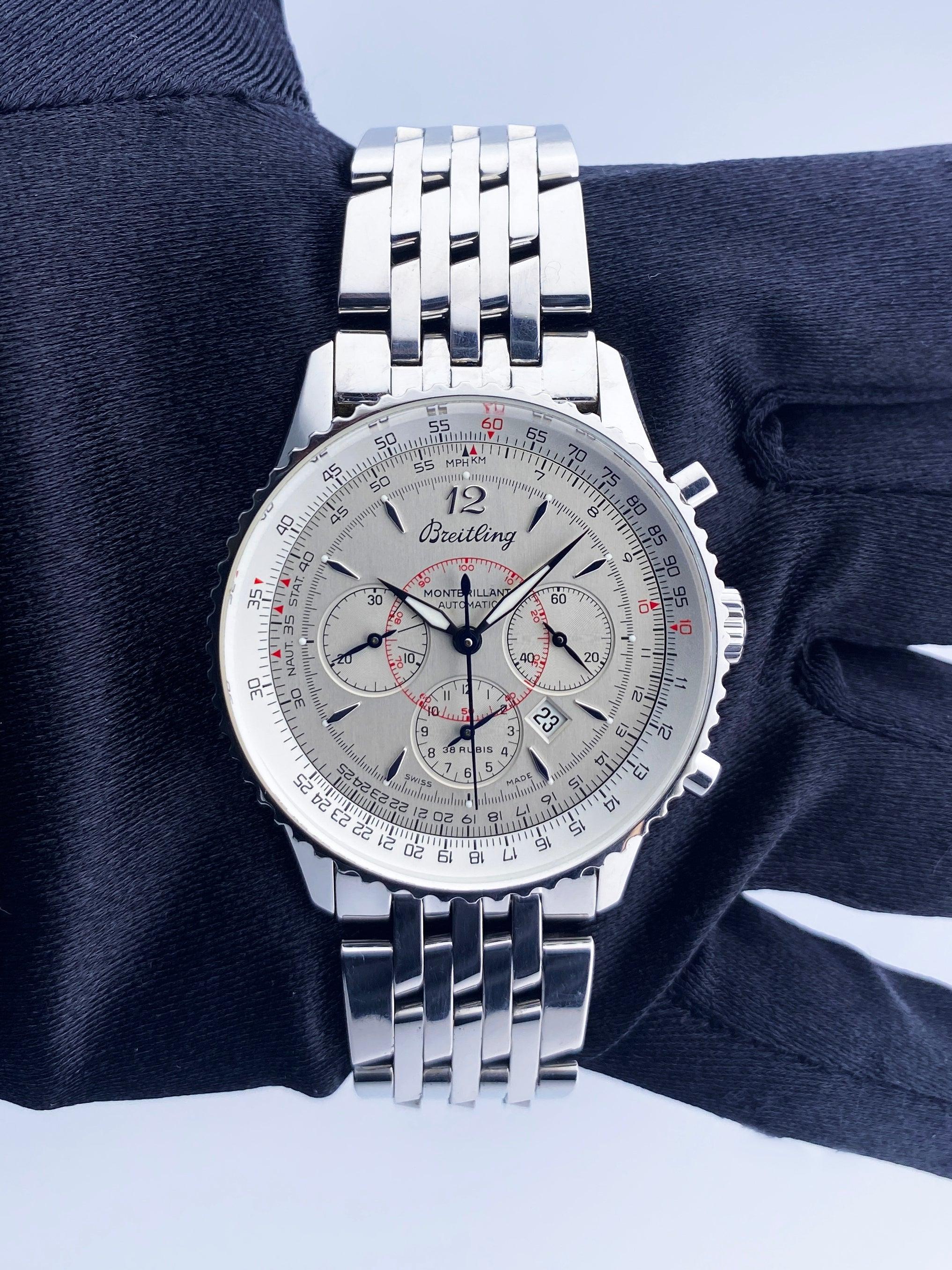 Breitling Navitimer Montbrillant A41330 Mens Watch. 38mm stainless steel case with stainless steel Bi-directional rotating bezel. Sliver dial with steel hands and Arabic numeral & index hour marker. Date display between 4 and 5 o'clock